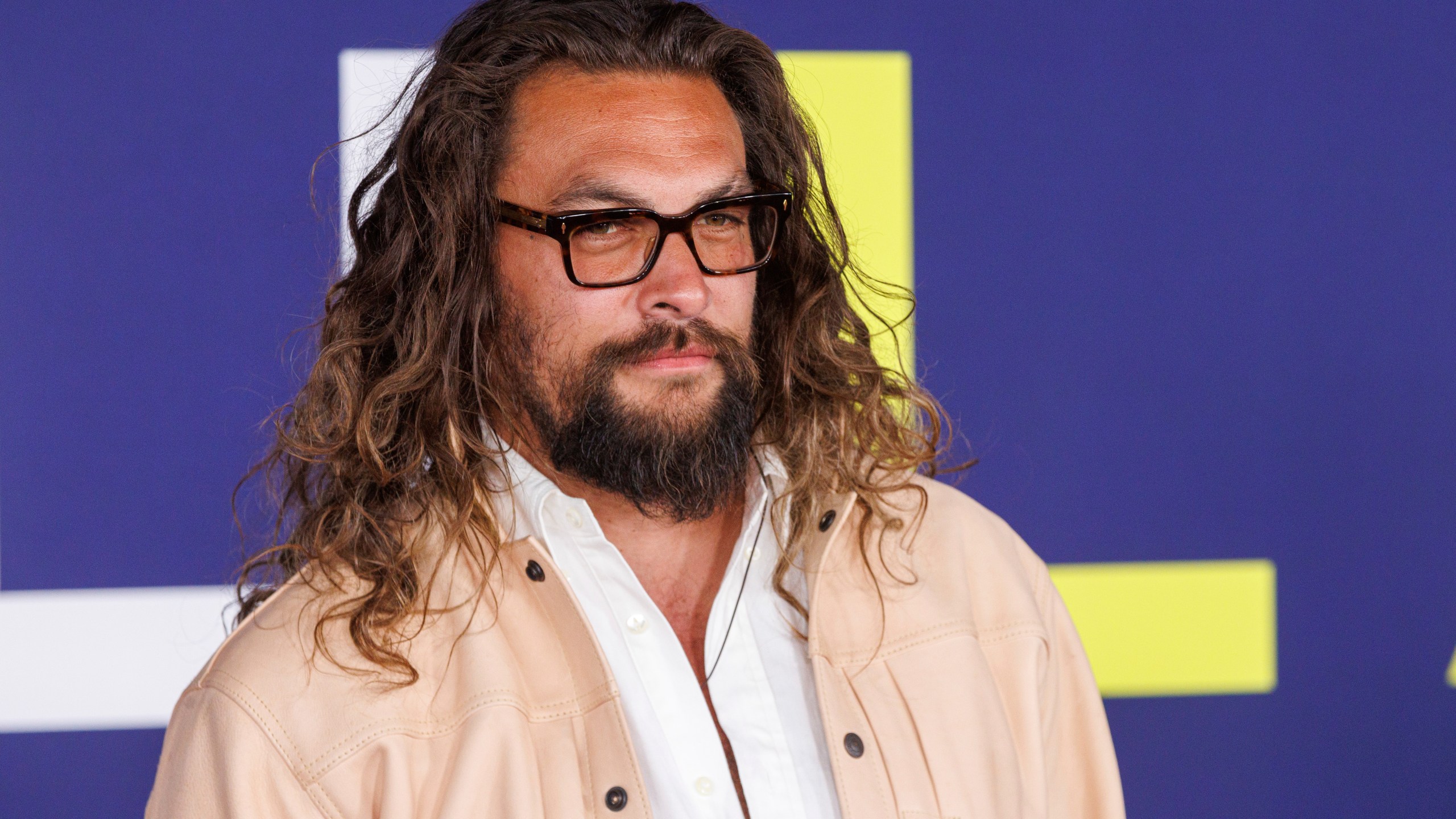 FILE - Jason Momoa appears at the premiere of "Ambulance" in Los Angeles on April 4, 2022 Momoa will host Discovery's “Shark Week,”. premiering on Sunday. (Photo by Willy Sanjuan/Invision/AP, File)