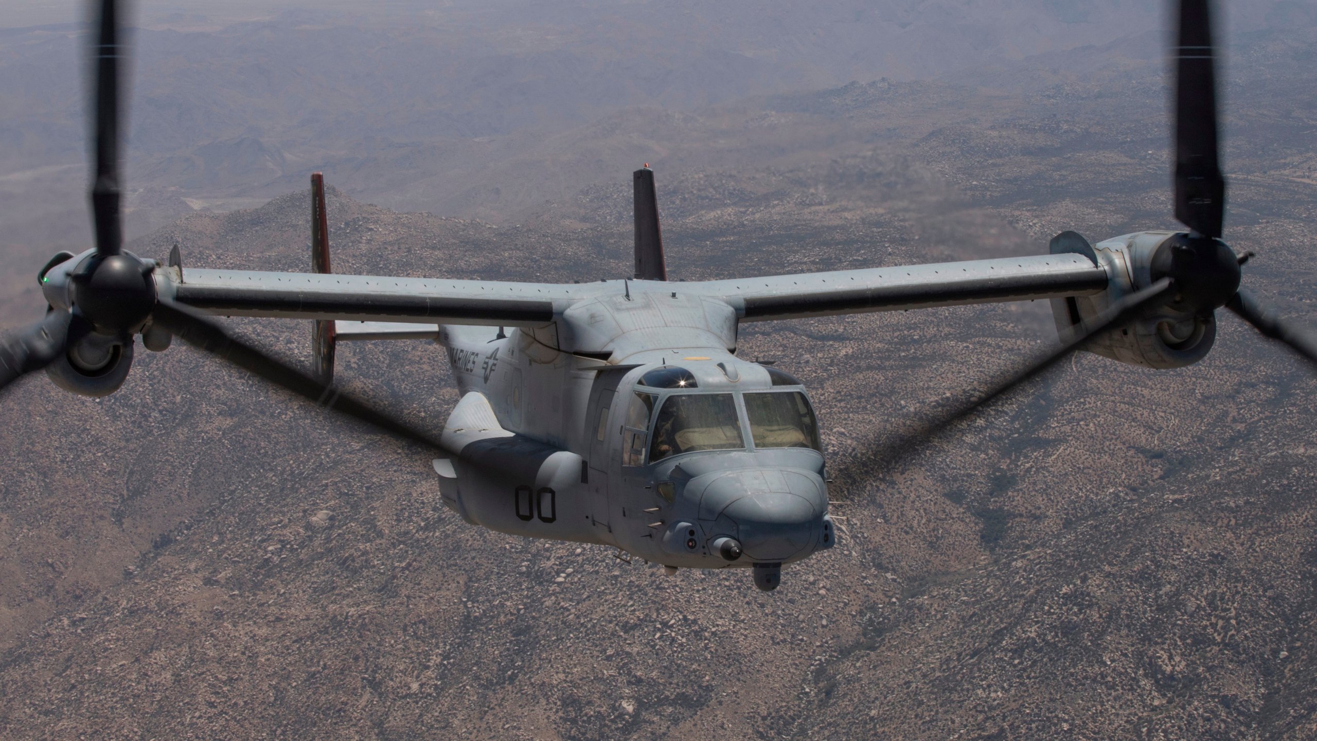 FILE - In this photo provided by U.S. Marine Corps/3rd MAW, an MV-22B Osprey with Marine Operational Test and Evaluation Squadron (VMX) 1 transports ordnance during an Expeditionary Advanced Base Operation (EABO) exercise to Old Highway 101 near Marine Corps Base Camp Pendleton, Calif., on May 25, 2022. The deadly crash of a Marine V-22 Osprey, like the one shown, in California last year was caused by mechanical failure, according to an investigation that ruled out pilot and maintenance errors. (U.S. Marine Corps via AP, File)