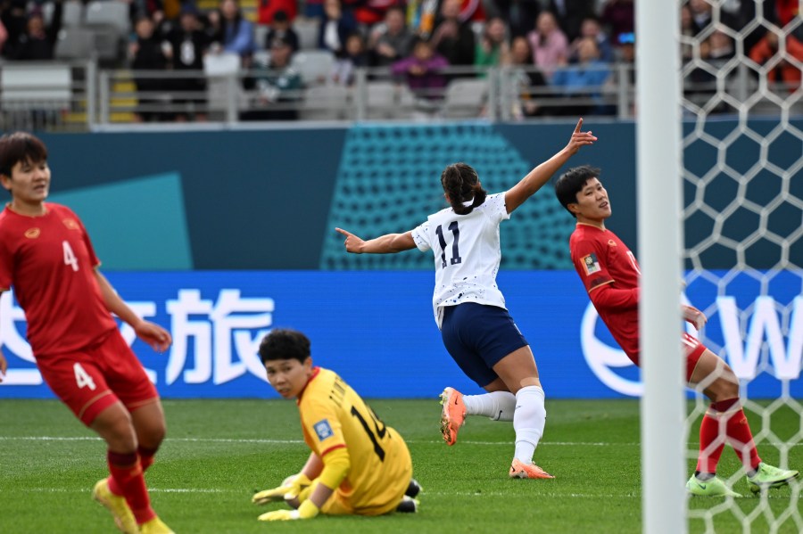 United States' Sophia Smith celebrates after scoring the opening goal during the Women's World Cup Group E soccer match between the United States and Vietnam at Eden Park in Auckland, New Zealand, Saturday, July 22, 2023. (AP Photo/Andrew Cornaga)