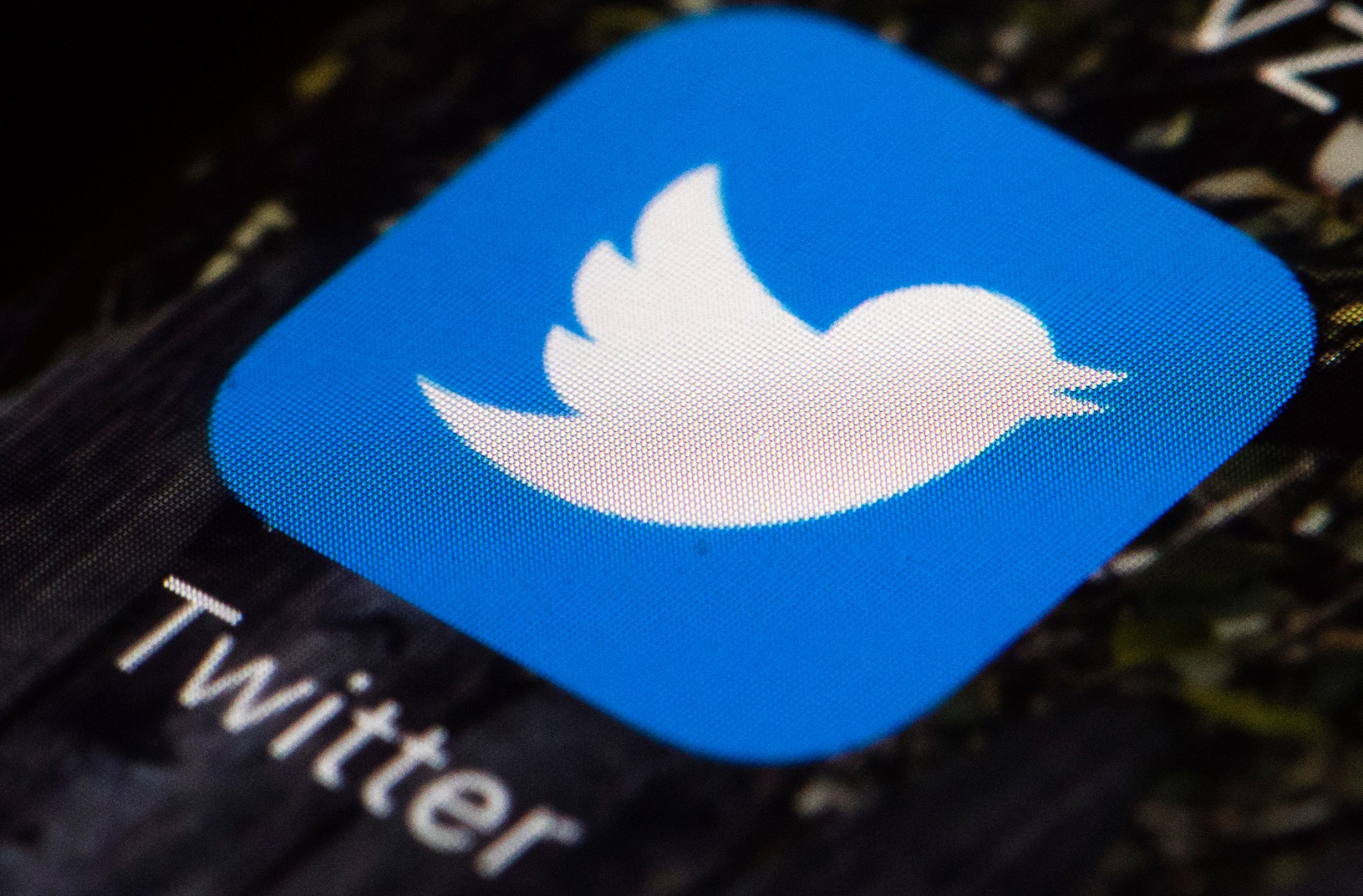 FILE - A Twitter app icon on a mobile phone is displayed in Philadelphia, U.S.A., April 26, 2017. Elon Musk plans to change the logo of Twitter to an “X” from the bird, marking what would be the latest big change since he bought the social media platform for $44 billion last year. (AP Photo/Matt Rourke, File)