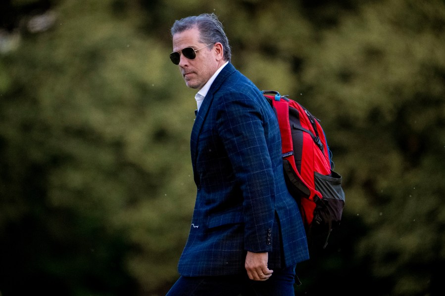 FILE - Hunter Biden, the son of President Joe Biden, walks from Marine One upon arrival at Fort McNair, June 25, 2023, in Washington. Hunter Biden is expected to appear before a federal judge Wednesday, July 26 to plead guilty to two tax crimes and admit to possessing a gun as a drug user in a deal with the Justice Department that is likely going to spare him time behind bars. (AP Photo/Andrew Harnik)