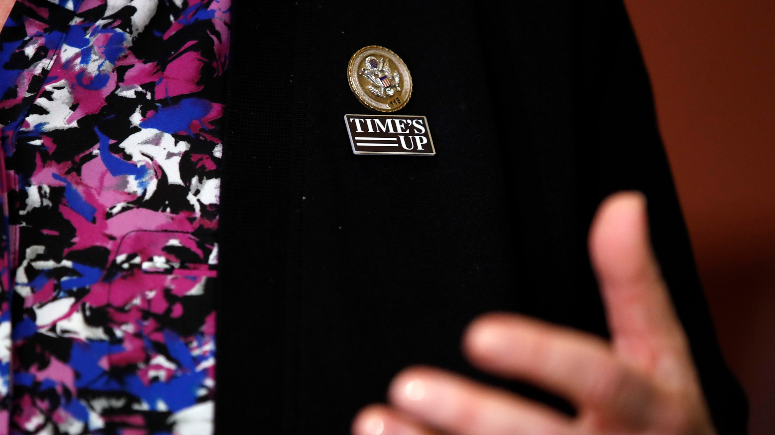 FILE - Rep. Lois Frankel, D-Fla., wears a "Times Up," pin as she speaks during an enrollment ceremony with House Speaker Paul Ryan of Wis., and Rep. Susan Brooks, R-Ind., for the, "Protecting Young Victims from Sexual Abuse and Safe Sport Authorization Act," on Capitol Hill, Tuesday, Feb. 6, 2018, in Washington. A 2021 survey by the global advocacy group, World Players, found 13% of 297 athletes surveyed across the globe had reported experiencing sexual abuse at least once as a child in sports. (AP Photo/Alex Brandon, File)