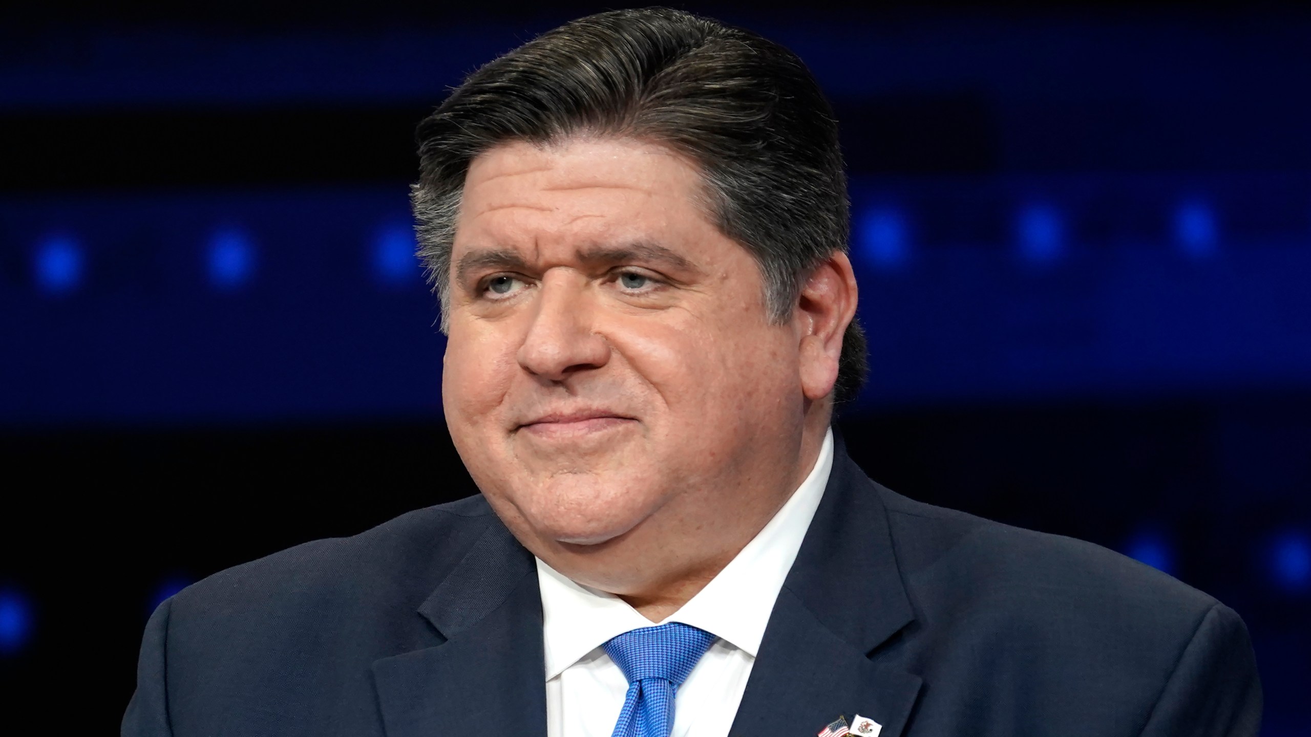 Illinois Gov. JB Pritzker participates in a debate with Republican gubernatorial challenger.