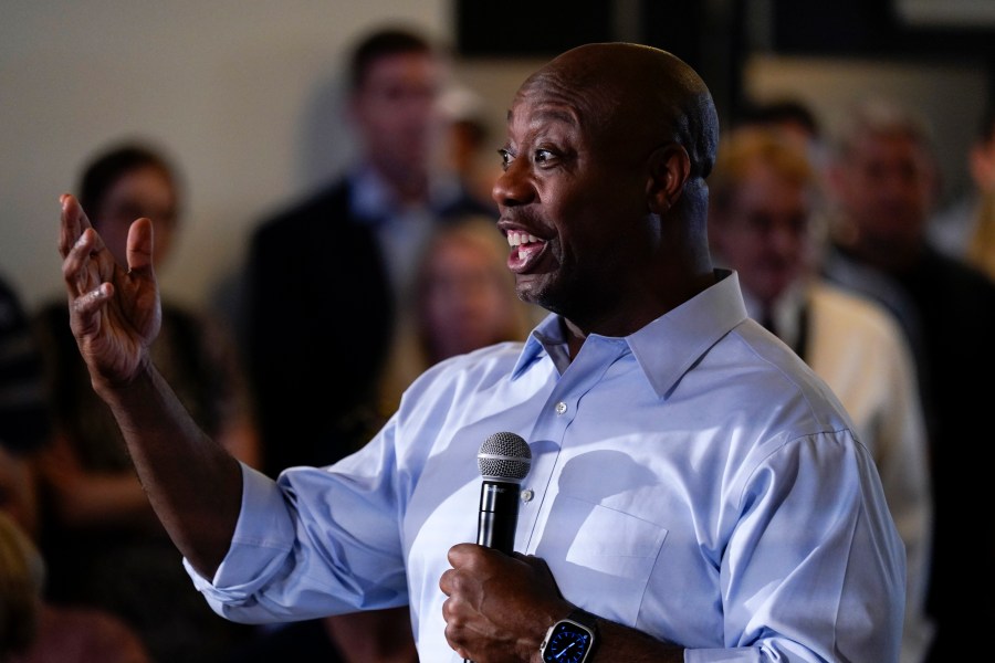 Republican presidential candidate Sen. Tim Scott, R-S.C., speaks during a town hall meeting, Thursday, July 27, 2023, in Ankeny, Iowa. (AP Photo/Charlie Neibergall)