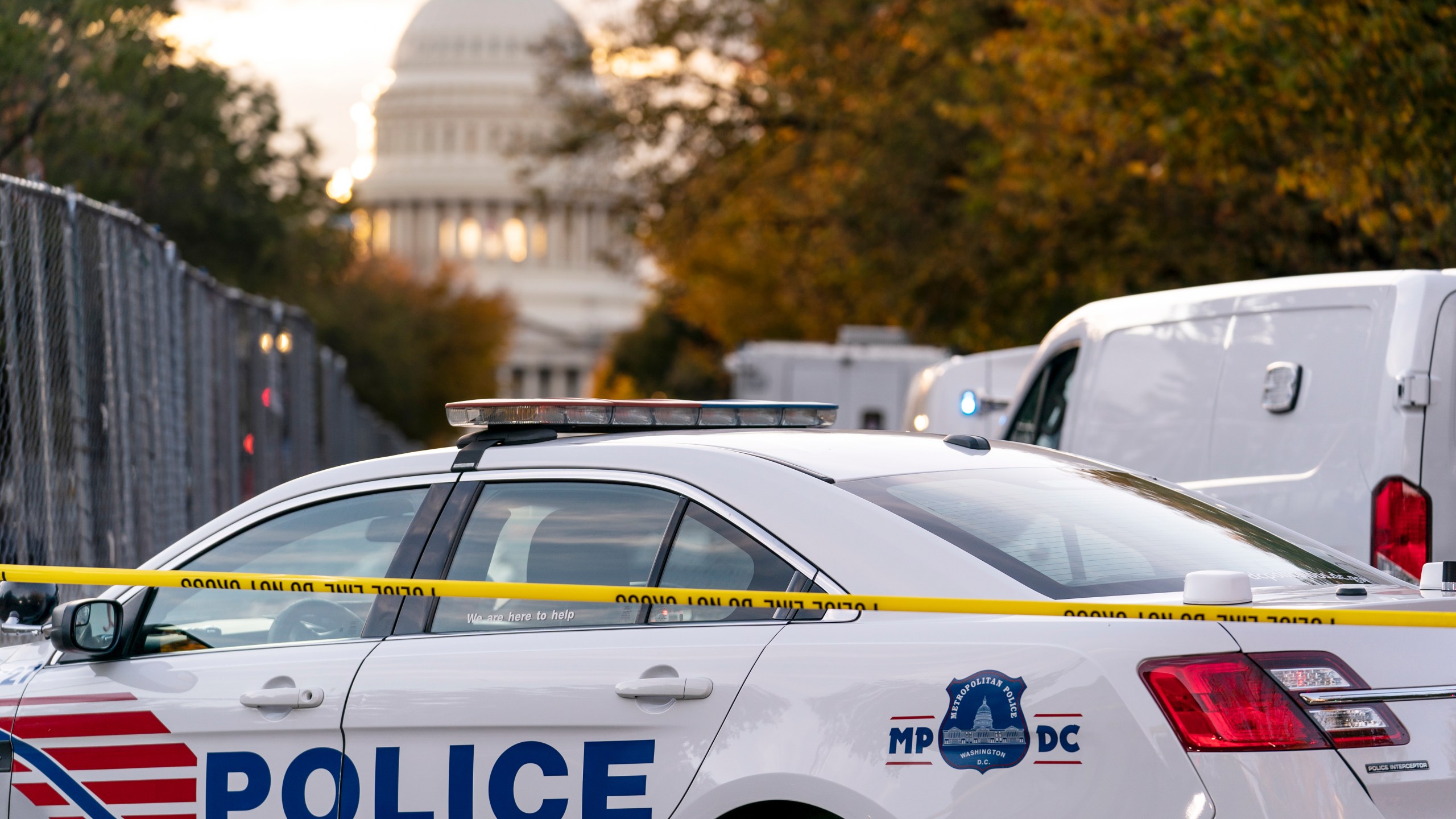 FILE - Washington Metropolitan Police investigate near the Supreme Court and Capitol after reports of a suspicious vehicle in which two men and a woman were detained with guns, Oct. 19, 2022, in Washington. District of Columbia Mayor Muriel Bowser's government has been struggling to handle steadily rising violent crime rates in recent years. Although police and city officials point out that overall crime rates have stayed steady, murders and carjackings have spiked — stoking public anxiety. (AP Photo/J. Scott Applewhite, File)