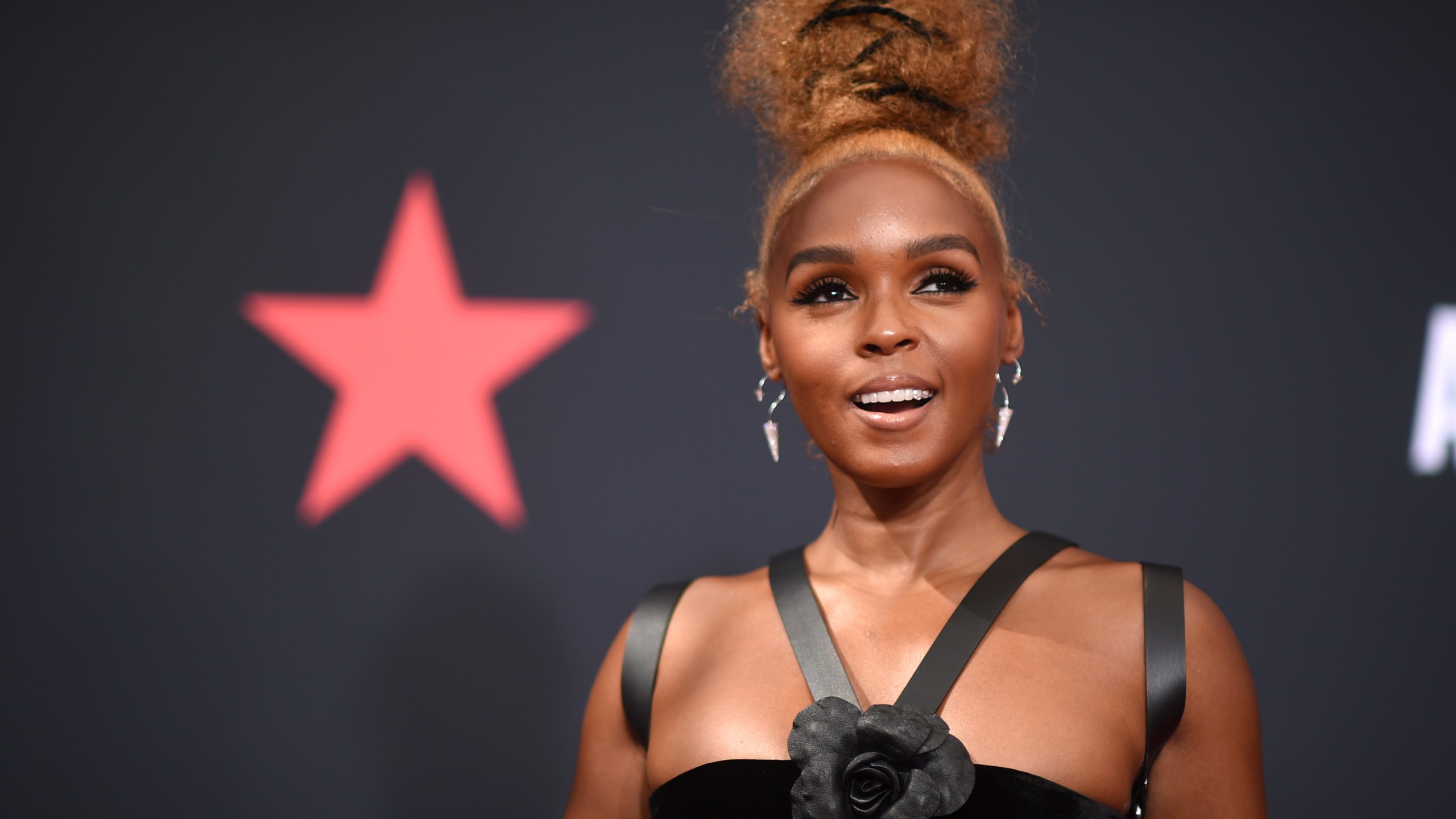 FILE - Janelle Monae arrives at the BET Awards on Sunday, June 26, 2022, at the Microsoft Theater in Los Angeles. The star, once known for sporting custom-made suits, has shed that attire to nearly bare all like on the cover of her fourth studio album “The Age of Pleasure,” where she’s seen swimming in a topless pool. Her upcoming 26-city tour kicks off in Seattle on Aug. 30, 2023.(Photo by Richard Shotwell/Invision/AP)