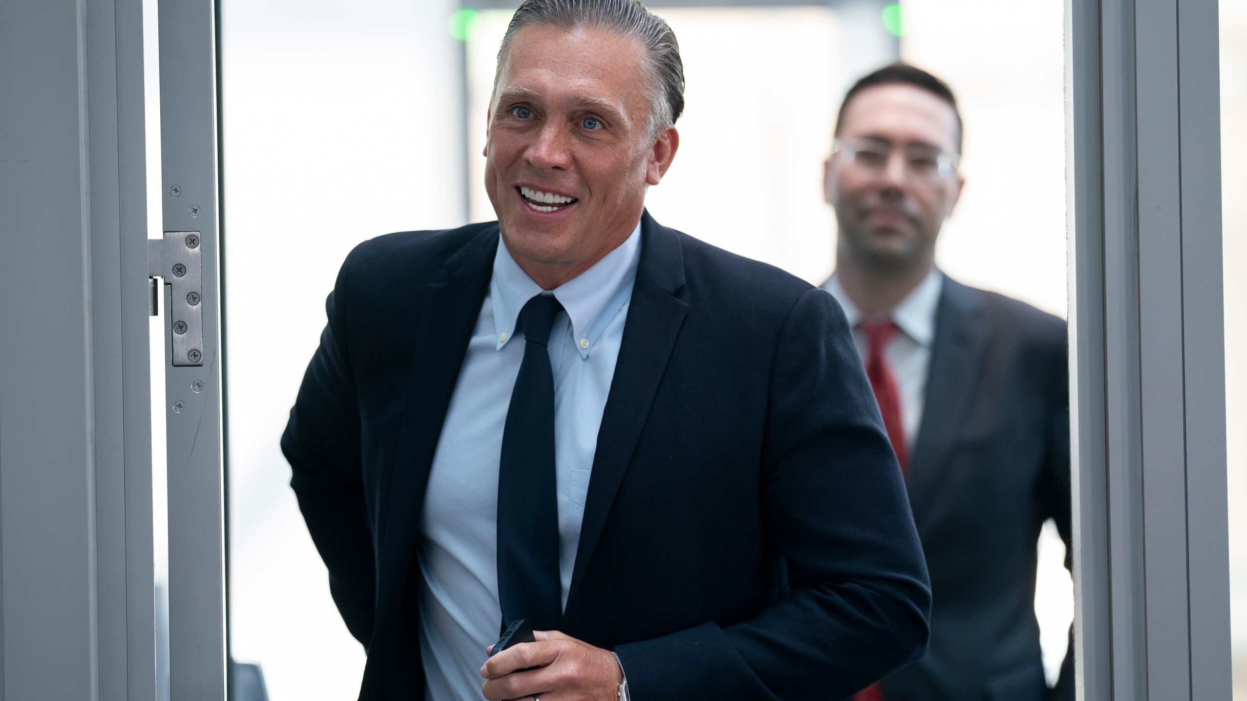 Devon Archer, Hunter Biden's former business partner, passes through the security checkpoint as he arrives on Capitol Hill to give closed-door testimony to the House Oversight Committee in the Republican-led investigations into President Biden's son, in Washington, Monday, July 31, 2023. (AP Photo/J. Scott Applewhite)