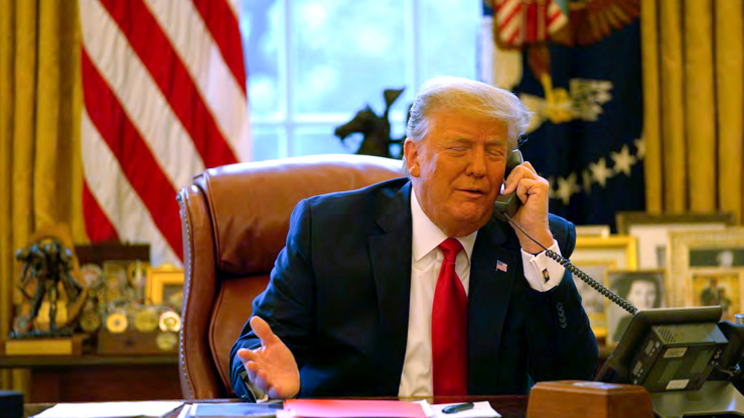 In this image released in the final report by the House select committee investigating the Jan. 6 attack on the U.S. Capitol, President Donald Trump talks on the phone to Vice President Mike Pence from the Oval Office of the White House on Jan. 6, 2021. (House Select Committee via AP)