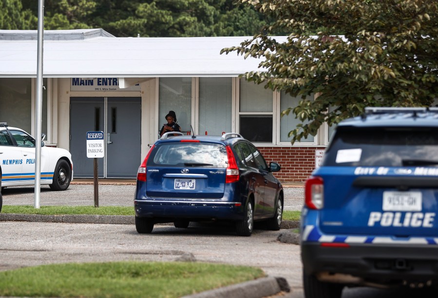 FILE - Memphis police officers work the scene of a shooting at Margolin Hebrew School on Monday, July 31, 2023, in Memphis, Tenn. A man suspected of trying to enter the Jewish school with a gun and firing shots outside the building has been charged with multiple crimes, the lead agency looking into the shooting said Wednesday, Aug. 2, 2023. (Mark Weber/Daily Memphian via AP, File)