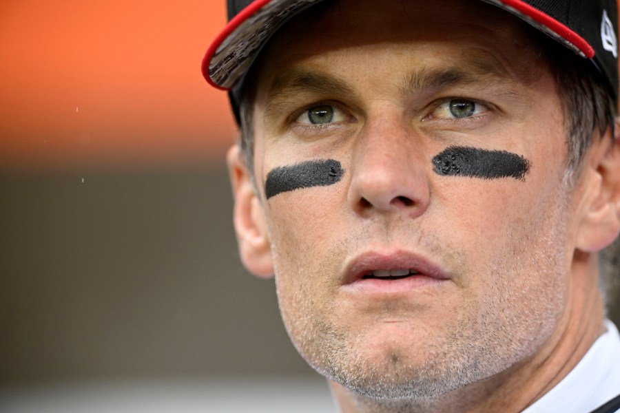 FILE - Tampa Bay Buccaneers quarterback Tom Brady stands on the field before an NFL football game against the Cleveland Browns, on Nov. 27, 2022, in Cleveland. Brady has become a minority owner of English second-tier soccer team Birmingham and wants to bring a winning mentality to an underperforming club. The seven-time Super Bowl champion has partnered with the club’s holding company, U.S.-based Knighthead Capital Management, and becomes chairman of a new advisory board, Brady and Birmingham said Thursday Aug. 3, 2023. (AP Photo/David Richard, File)