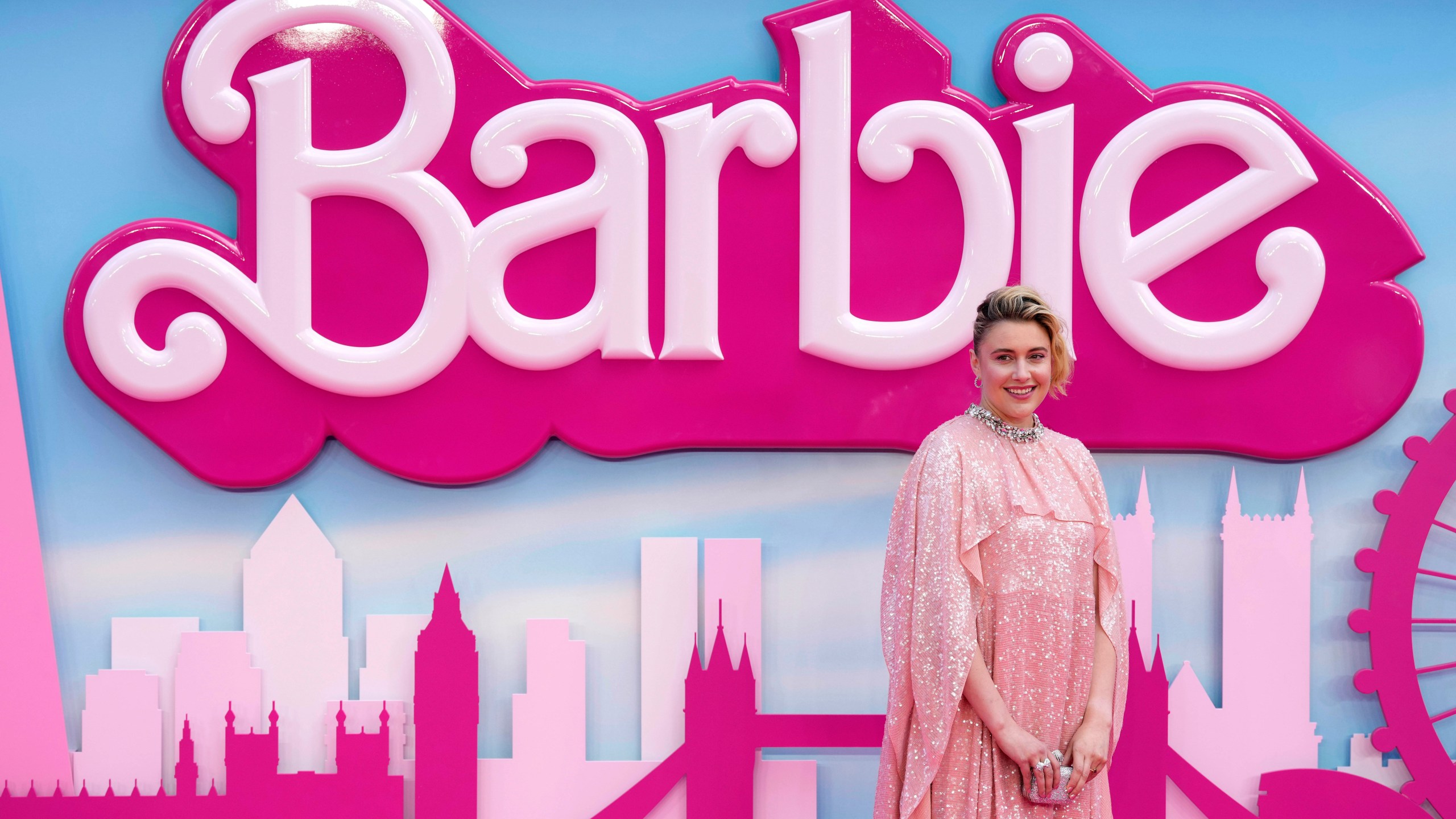 Writer/director/executive producer Greta Gerwig poses for photographers upon arrival at the premiere of the film 'Barbie' on Wednesday, July 12, 2023, in London. (Scott Garfitt/Invision/AP)