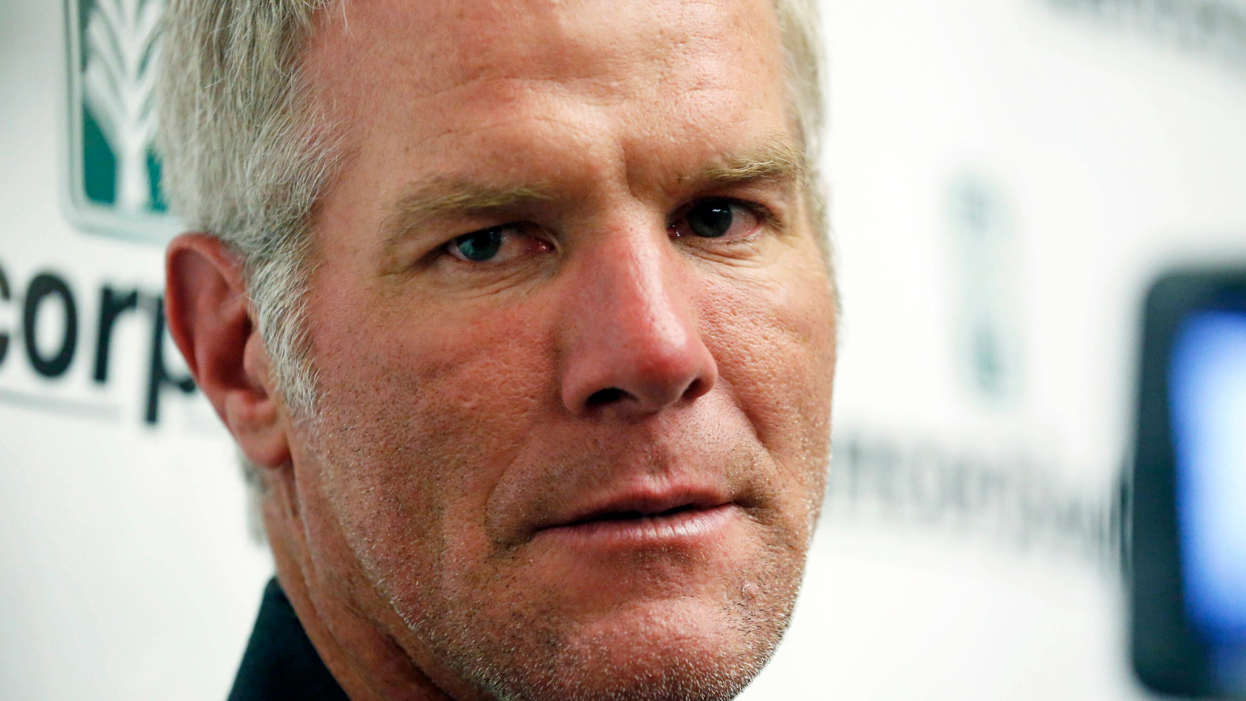 FILE - Former NFL quarterback Brett Favre speaks with reporters prior to his induction to the Mississippi Hall of Fame in Jackson, Miss., Aug. 1, 2015. The Mississippi Supreme Court said Wednesday, Aug. 9, 2023, that it will not remove Favre as a defendant in a civil lawsuit that seeks to recover millions of dollars of misspent welfare money meant to help some of the poorest people in the United States. (AP Photo/Rogelio V. Solis, File)