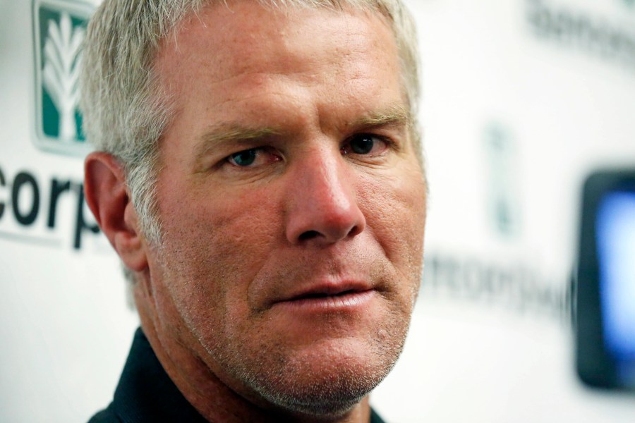 FILE - Former NFL quarterback Brett Favre speaks with reporters prior to his induction to the Mississippi Hall of Fame in Jackson, Miss., Aug. 1, 2015. The Mississippi Supreme Court said Wednesday, Aug. 9, 2023, that it will not remove Favre as a defendant in a civil lawsuit that seeks to recover millions of dollars of misspent welfare money meant to help some of the poorest people in the United States. (AP Photo/Rogelio V. Solis, File)