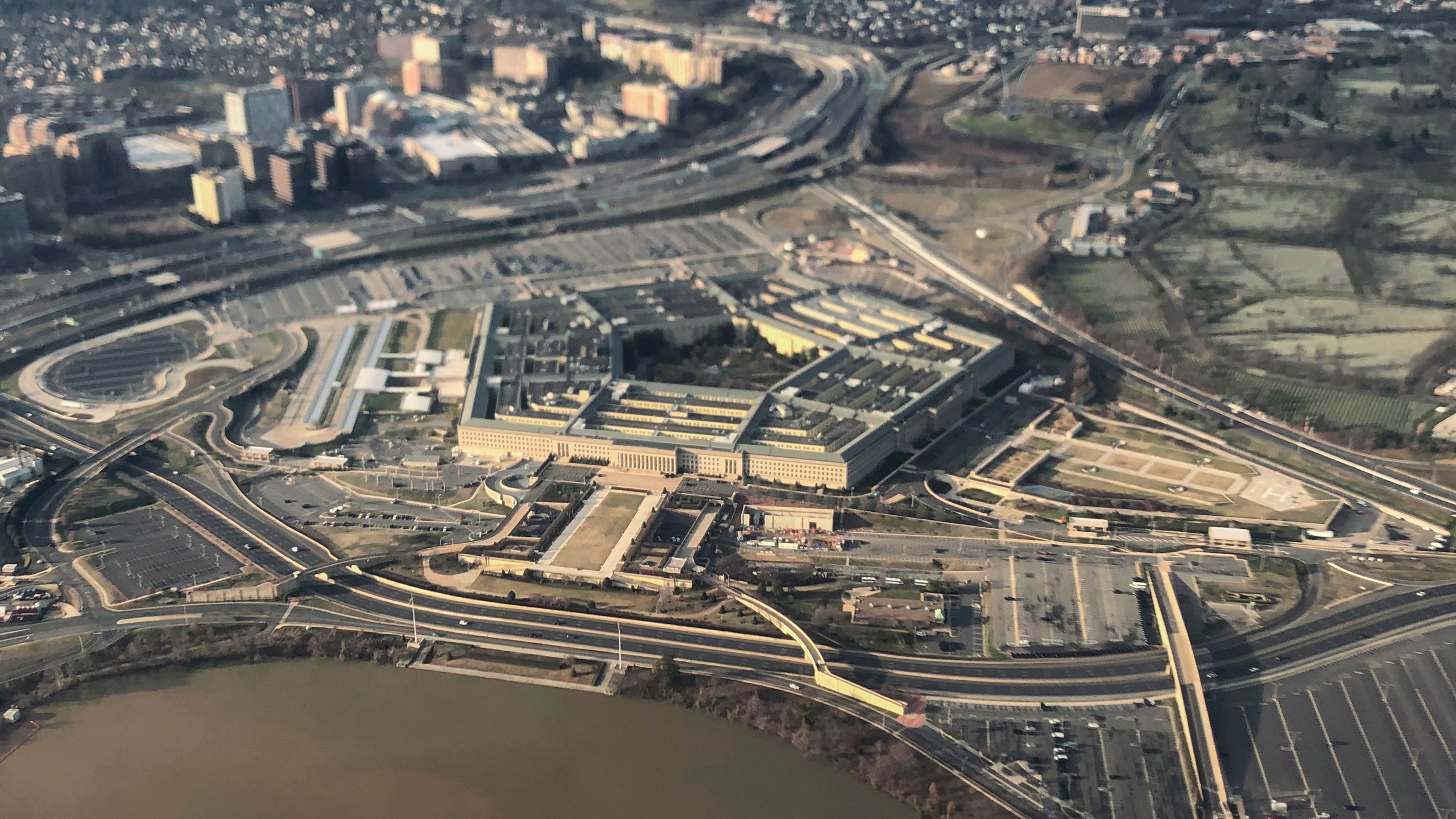 FILE - The Pentagon is seen in this aerial view in Washington, Jan. 26, 2020. The U.S. military academies must improve their leadership, stop toxic practices such as hazing and shift behavior training into the classrooms, according to a Pentagon study aimed at addressing an alarming spike in sexual assaults and misconduct. (AP Photo/Pablo Martinez Monsivais, File)