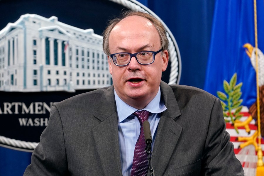 FILE - Jeffrey Clark, Assistant Attorney General for the Environment and Natural Resources Division, speaks during a news conference at the Justice Department in Washington, on Sept. 14, 2020. Former Justice Department lawyer Jeffrey Clark and former Georgia Republican Party chair David Shafer, who were indicted last week along with former President Donald Trump, have filed paperwork to transfer the case to federal court. (AP Photo/Susan Walsh, Pool, File)