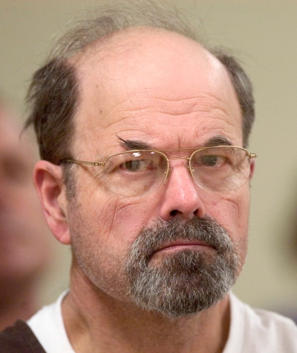 FILE - Convicted BTK killer Dennis Rader listens during a court proceeding, Oct. 12, 2005, in El Dorado, Kan. On Wednesday, Aug. 23, 2023, authorities in Oklahoma and Missouri said they are investigating whether the BTK serial killer was responsible for other homicides, with their search leading them to dig on Tuesday, Aug. 22, near his former Kansas property. (Travis Heying/The Wichita Eagle via AP, Pool, File)