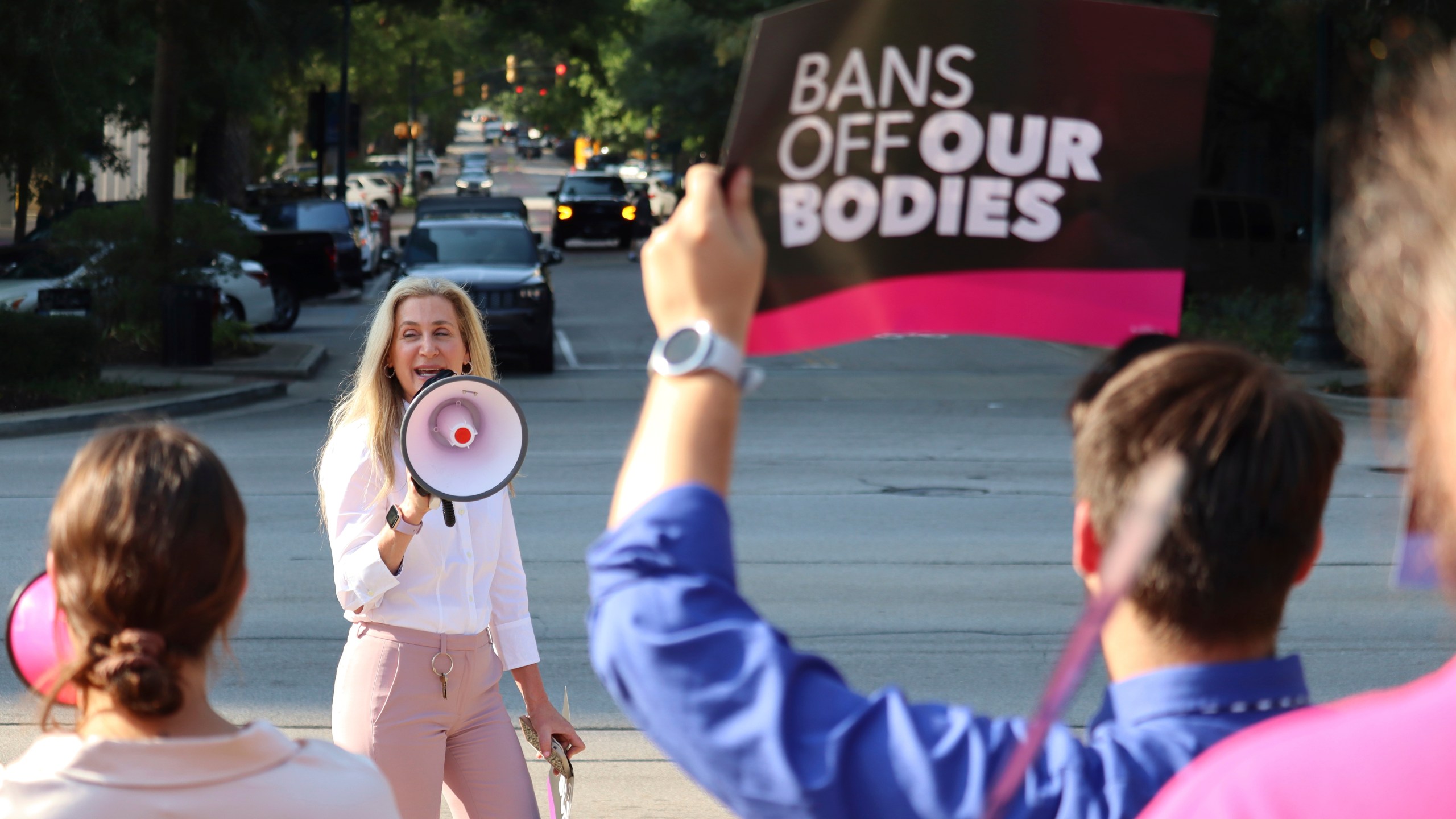 Democratic South Carolina Rep. Beth Bernstein leads chants at an abortion rights rally in Columbia, S.C., on Wednesday, Aug. 23, 2023. The South Carolina Supreme Court ruled Wednesday to uphold a law banning most abortions except in the earliest weeks of pregnancy. (AP Photo/James Pollard)