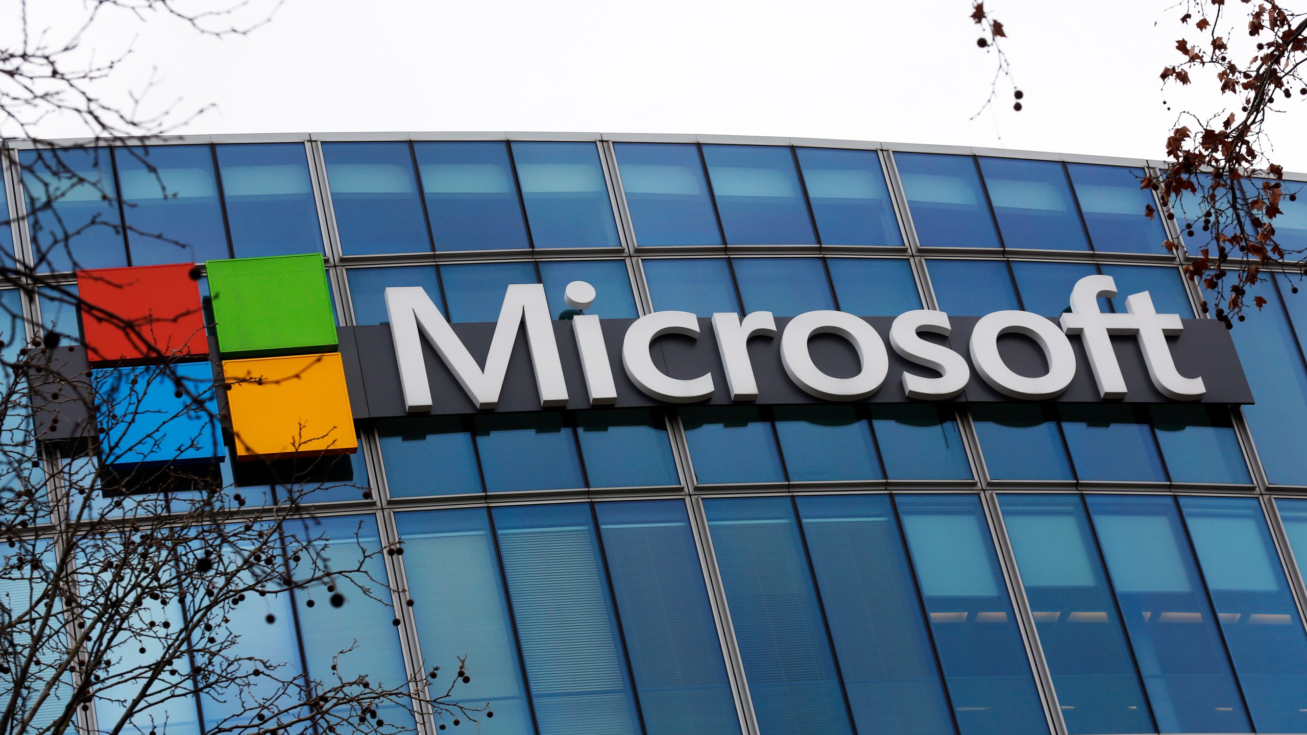 FILE - The Microsoft logo is pictured outside the headquarters in Paris, on Jan. 8, 2021. Microsoft said Thursday Aug. 31, 2023 its will stop combining its Teams messaging and videoconferencing app with its Office productivity software for European customers, in a move to head off a possible European Union antitrust penalty. (AP Photo/Thibault Camus, File)