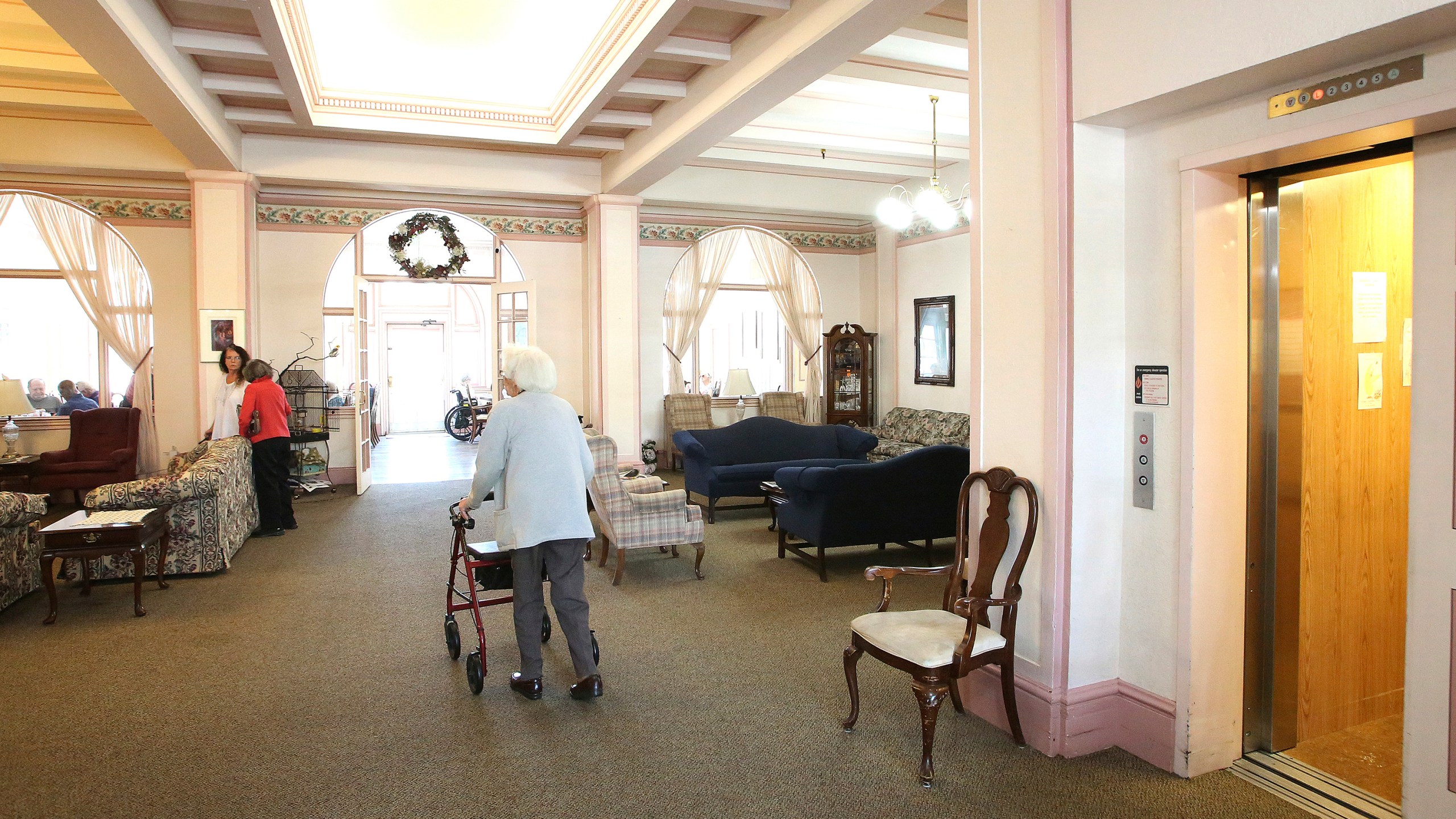 FILE - Bret Harte Retirement Inn residents make their way down to the dining room for lunch, May 6, 2020, in Grass Valley, Calif. The federal government will, for the first time, dictate staffing levels at nursing homes, the Biden administration said Friday, Sept. 1, 2023, responding to systemic problems bared by mass COVID deaths. (Elias Funez/The Union via AP, File)