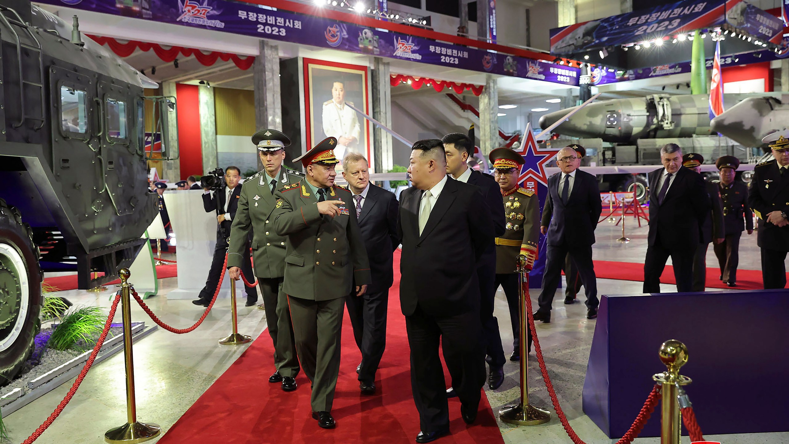 FILE - In this photo provided by the North Korean government, North Korean leader Kim Jong Un, center right, and Russian Defense Minister Sergei Shoigu, front left, visit an arms exhibition in Pyongyang, North Korea, on July 26, 2023. Independent journalists were not given access to cover the event depicted in this image distributed by the North Korean government. The content of this image is as provided and cannot be independently verified. Korean language watermark on image as provided by source reads: "KCNA" which is the abbreviation for Korean Central News Agency. (Korean Central News Agency/Korea News Service via AP, File)