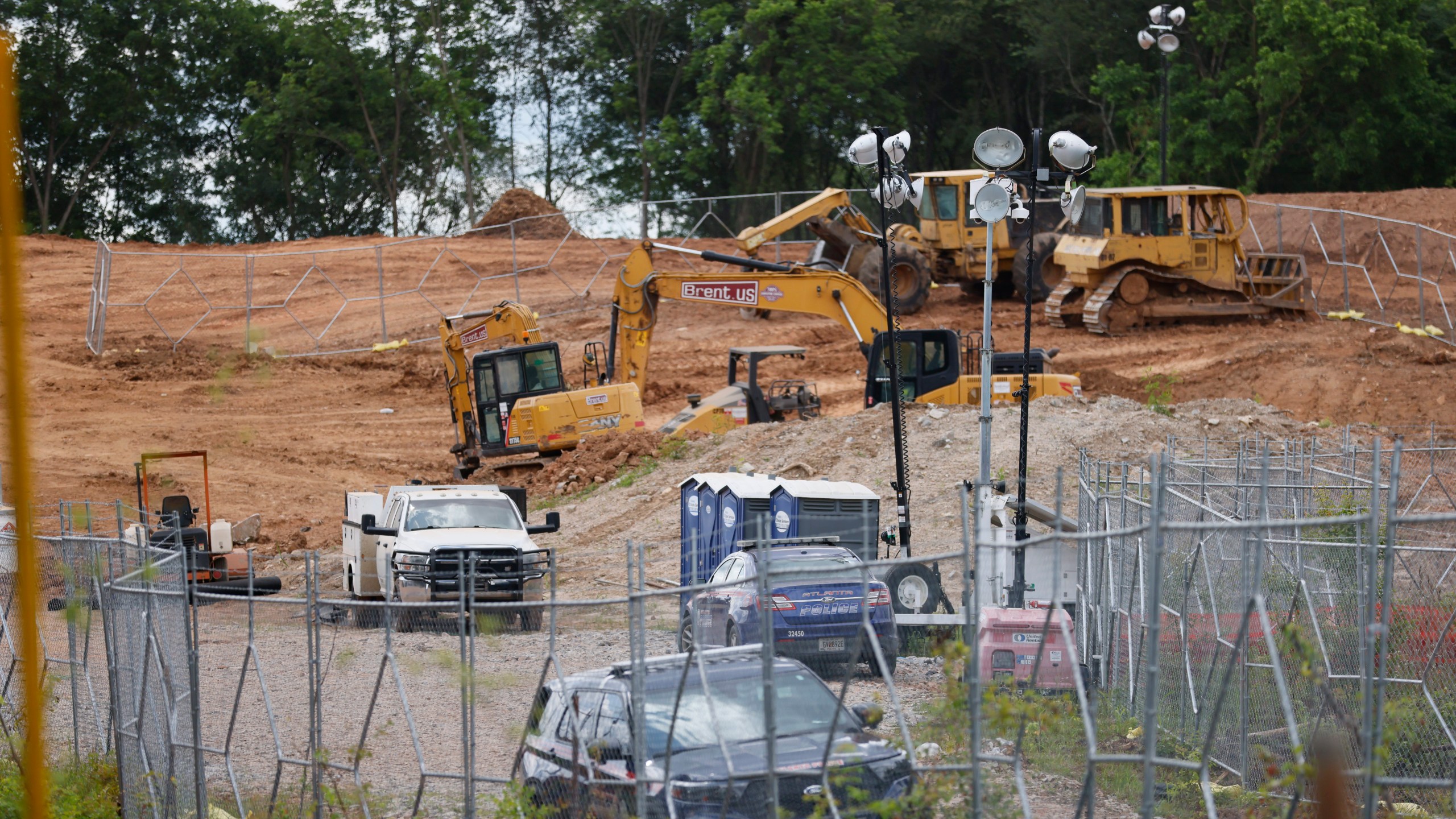 FILE - Bulldozers and heavy trucks are clearing the future site of the Atlanta Public Safety Training Center, May 30, 2023, in Atlanta. Sixty-one people have been indicted in Georgia on racketeering charges following a long-running state investigation into protests against a proposed police and training facility in the Atlanta area that critics call “Cop City.” The Tuesday, Aug. 29, 2023, indictment under the state’s racketeering law was released by Fulton County officials on Tuesday, Sept. 5. (Miguel Martinez/Atlanta Journal-Constitution via AP, File)