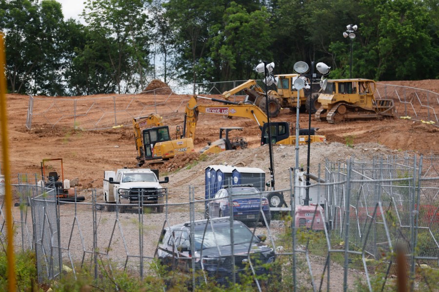 FILE - Bulldozers and heavy trucks are clearing the future site of the Atlanta Public Safety Training Center, May 30, 2023, in Atlanta. Sixty-one people have been indicted in Georgia on racketeering charges following a long-running state investigation into protests against a proposed police and training facility in the Atlanta area that critics call “Cop City.” The Tuesday, Aug. 29, 2023, indictment under the state’s racketeering law was released by Fulton County officials on Tuesday, Sept. 5. (Miguel Martinez/Atlanta Journal-Constitution via AP, File)