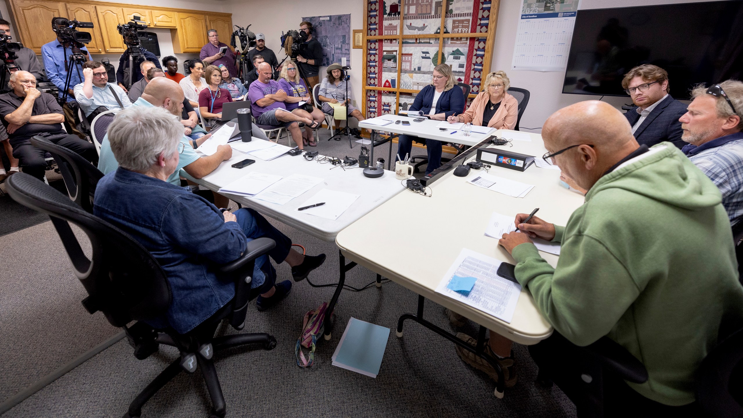 The Goodhue council convenes for a special meeting to address the police department in Goodhue, Minn. The small town will soon be without a police department, an exodus spurred by low pay for the chief and his officers. (Carlos Gonzalez/Star Tribune via AP)