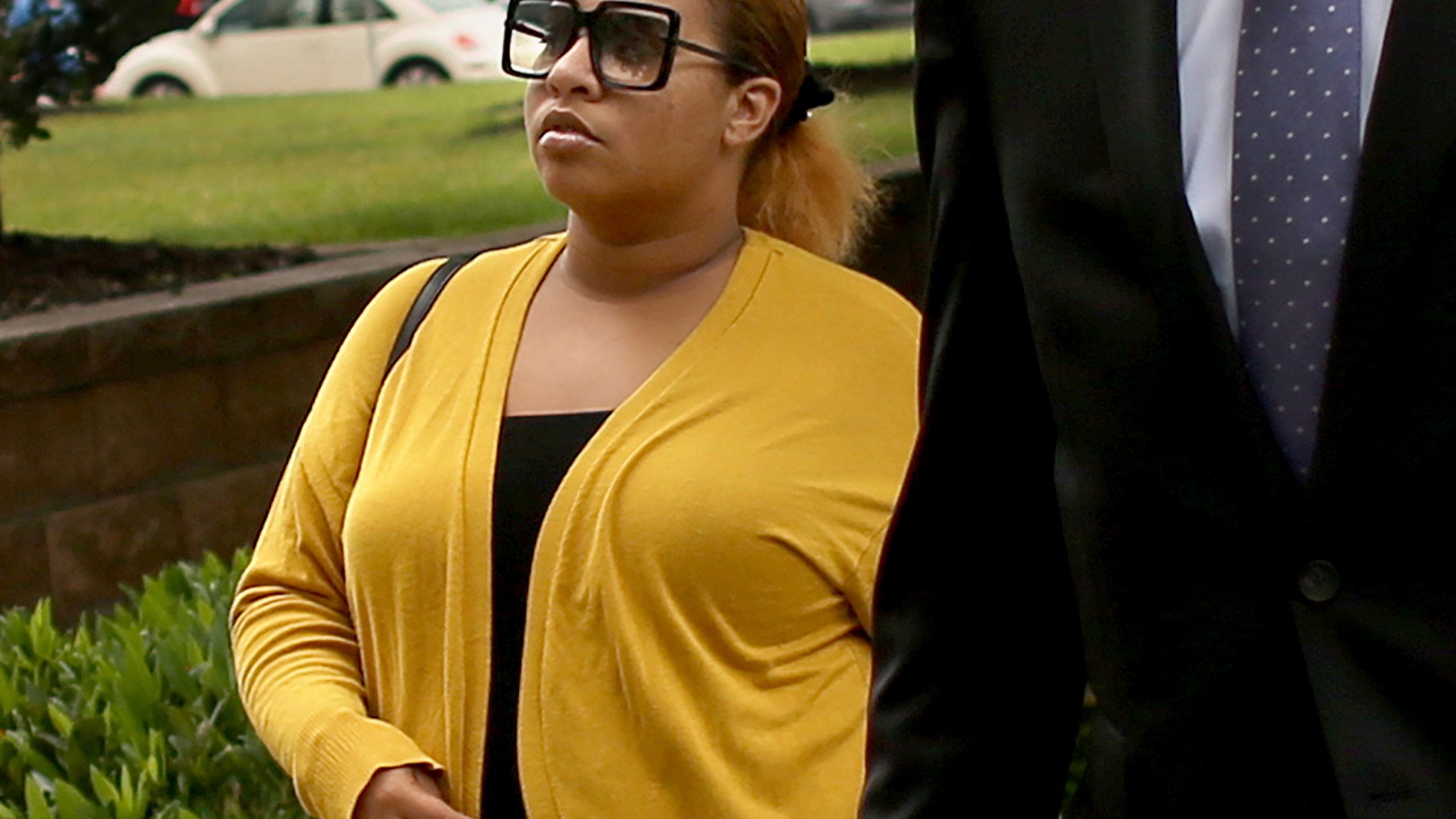 Deja Taylor arrives at federal court, Monday, June 12, 2023, in Virginia Beach, Va. Prosecutors have asked a federal judge to revoke the bond for Taylor, the mother of a Virginia boy who shot and wounded his first-grade teacher, after she allegedly failed multiple drug tests while awaiting sentencing on two felony charges. Taylor pleaded guilty in June to having a gun while possessing marijuana and to lying on a federal background check form when she purchased the 9mm handgun her son used to shoot teacher Abigail Zwerner at the Richneck Elementary School in Newport News. (Stephen M. Katz/The Virginian-Pilot via AP)