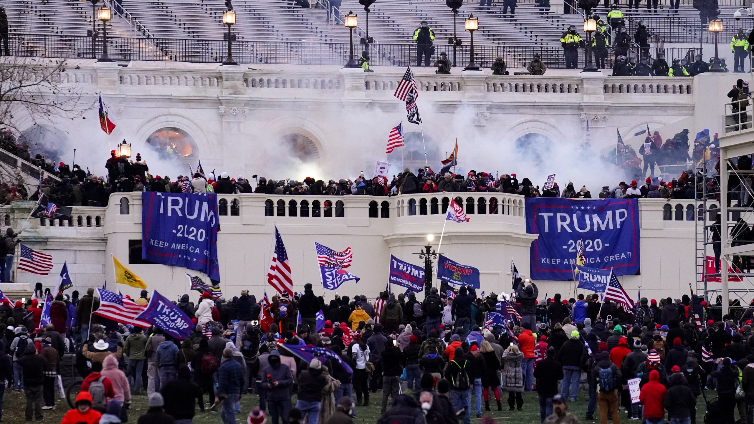 FILE - Violent rioters loyal to President Donald Trump storm the Capitol in Washington on Jan. 6, 2021. Leo Brent Bozell IV, 44, of Palmyra, Pa., the son of a prominent conservative activist, has been convicted of charges that he stormed the U.S. Capitol on Jan. 6, 2021, bashed in a window, chased a police officer, invaded the Senate floor and helped a mob disrupt the certification of Democrat Joe Biden's presidential election victory. Bozell was found guilty Friday, Sept. 8, 2023, of 10 charges, according to a Justice Department news release. (AP Photo/John Minchillo, File)