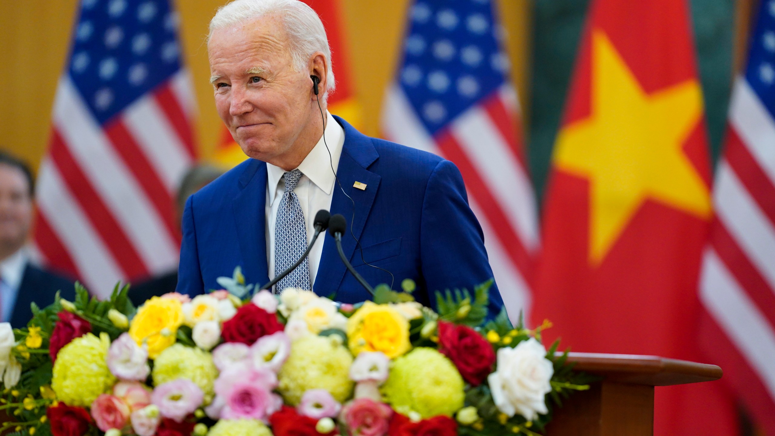 U.S. President Joe Biden and Vietnam's General Secretary Nguyen Phu Trong, unseen, deliver remarks after their meeting at the Communist Party of Vietnam Headquarters, in Hanoi, Vietnam, Sunday, Sept. 10, 2023. (AP Photo/Evan Vucci)