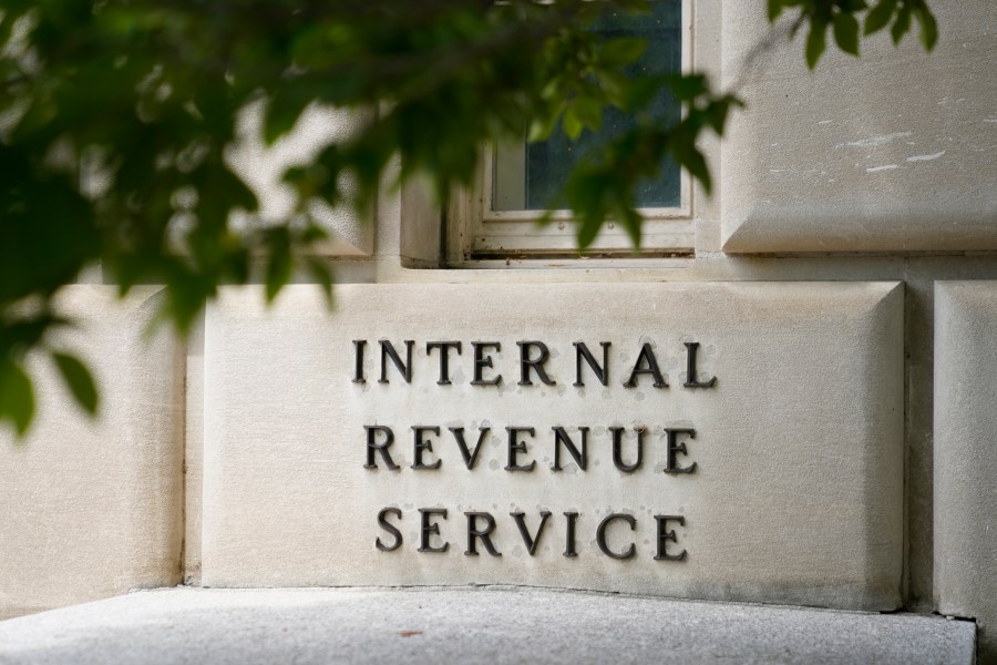 FILE - A sign outside the Internal Revenue Service building is seen, May 4, 2021, in Washington. The IRS is pausing accepting claims for the Employee Retention Credit, a pandemic-era tax credit, until 2024 due to rising concerns that an influx of applications are fraudulent. The IRS said Thursday, Sept. 14, 2023, that hundreds of criminal cases have been started and thousands of ERC claims have been referred for audit. (AP Photo/Patrick Semansky, File)