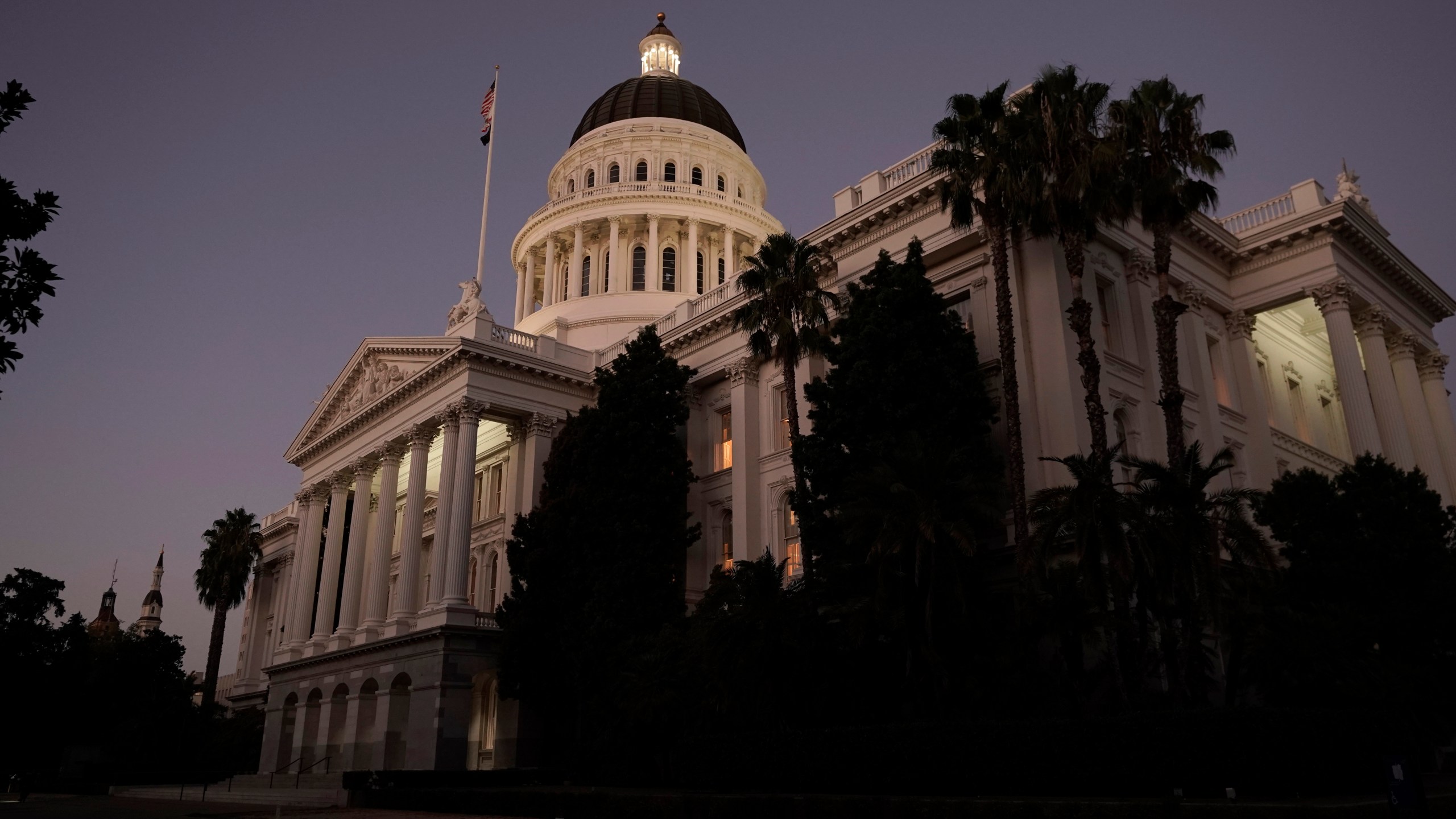 FILE - The lights of the state Capitol glow into the night in Sacramento, Calif., Wednesday, Aug. 31, 2022. California, which already has some of the strongest digital privacy laws in the U.S., is on the verge of handing consumers a major new tool to combat the sale and secret use of personal information they may never have agreed to share. Both houses of the state legislature have passed the Delete Act, which would establish a “one stop shop” where individuals could order hundreds of often shadowy data brokers to delete information such as their location history and financial details.(AP Photo/Rich Pedroncelli, File)