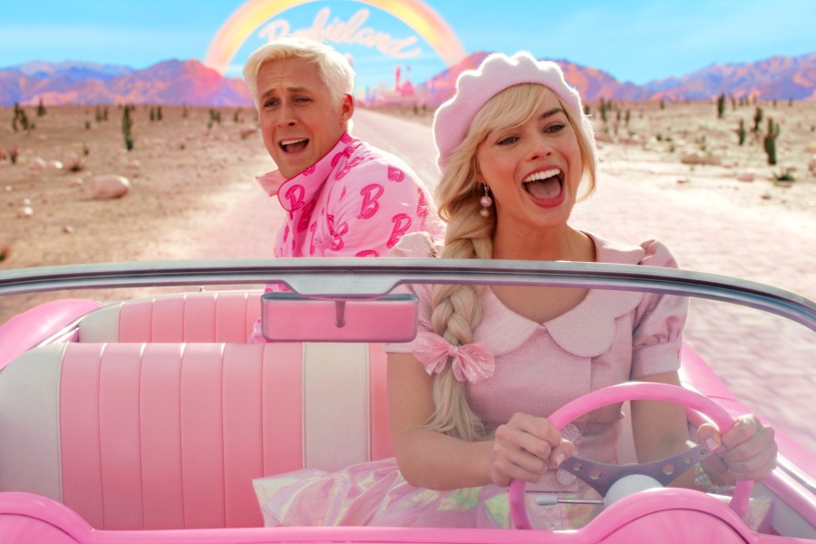 This image released by Warner Bros. Pictures shows Ryan Gosling, left, and Margot Robbie in a scene from "Barbie." (Warner Bros. Pictures via AP)