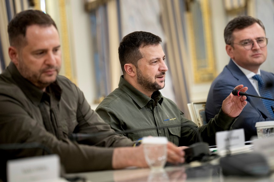 Ukraine's Head of the Office of the President Andriy Yermak, left, and Ukraine's Foreign Minister Dmytro Kuleba, right, listen as Ukraine's President Volodymyr Zelenskyy meets with U.S. Secretary of State Antony Blinken in Kyiv, Ukraine, Wednesday, Sept. 6, 2023. (Brendan Smialowski/Pool via AP)