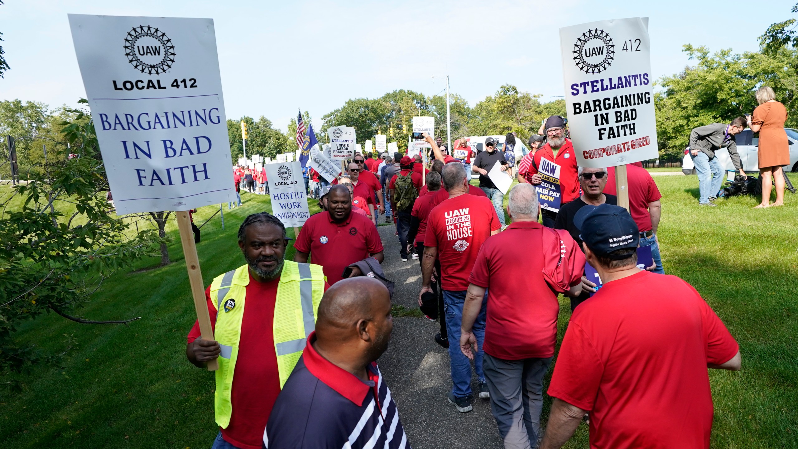 United Auto Workers march outside the Stellantis North American Headquarters, Wednesday, Sept. 20, 2023, in Auburn Hills, Mich. (AP Photo/Carlos Osorio)