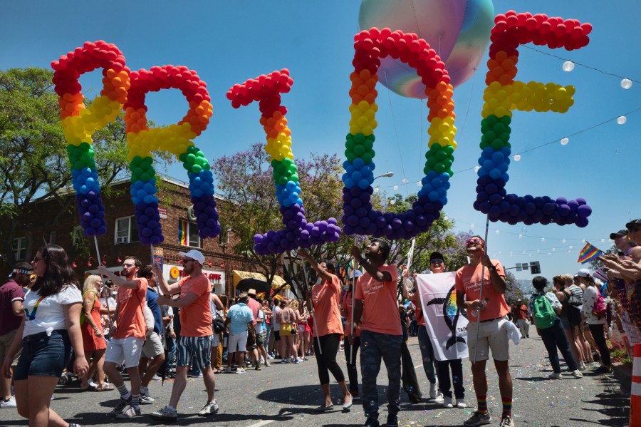 FILE - Participants take part in the annual LA Pride Parade in West Hollywood, Calif., Sunday, June 9, 2019. California Gov. Gavin Newsom signed several bills Saturday, Sept. 23, 2023, aimed at bolstering the state's protections for LGBTQ+ people, despite a controversial veto the day before that was criticized by advocates. (AP Photo/Richard Vogel, File)