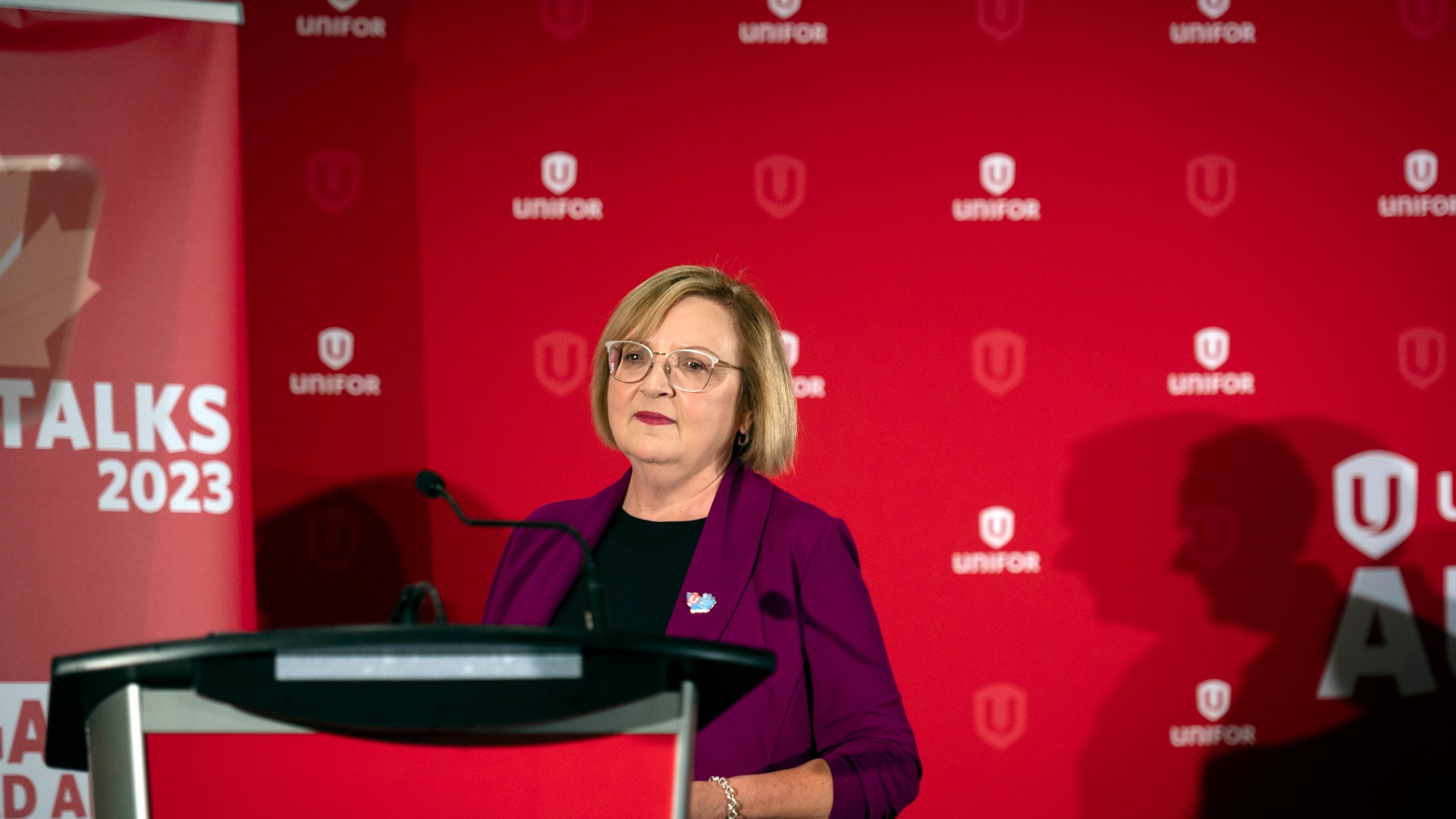 FILE - Lana Payne, Unifor national president speaks during a news conference, Aug. 29, 2023, in Toronto. Unifor, which represents about 4,300 workers at three General Motors facilities in Canada, said Monday, Sept. 25, 2023, that it reached a strong deal with Ford and now will try to negotiate a pattern agreement with GM. (Tijana Martin/The Canadian Press via AP, File)