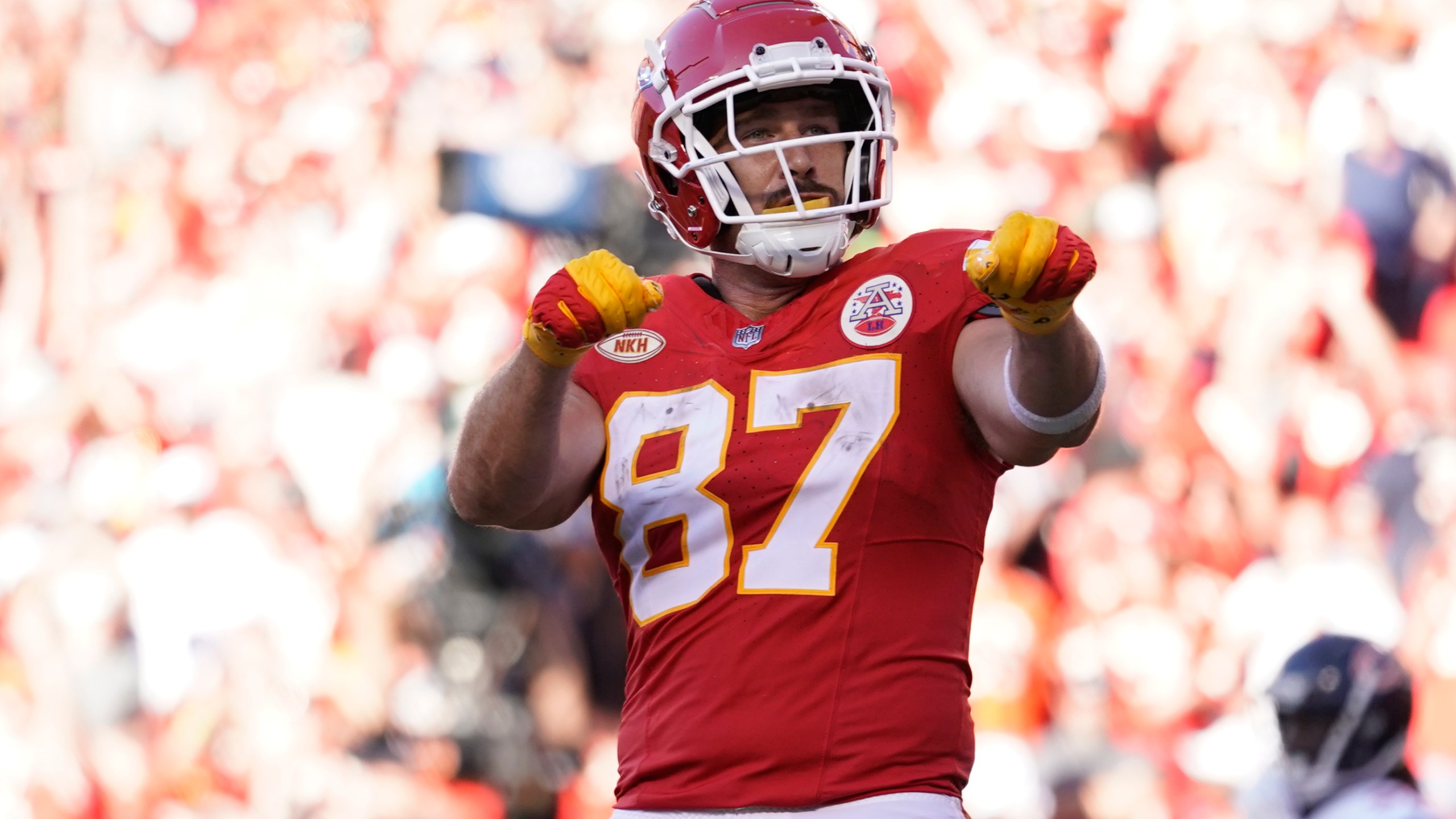 File - Kansas City Chiefs tight end Travis Kelce celebrates after scoring during the second half of an NFL football game against the Chicago Bears Sunday, Sept. 24, 2023, in Kansas City, Mo. Following Taylor Swift's appearance at the game, jersey sales for the All-Pro tight-end seemingly skyrocketed. (AP Photo/Ed Zurga, File)