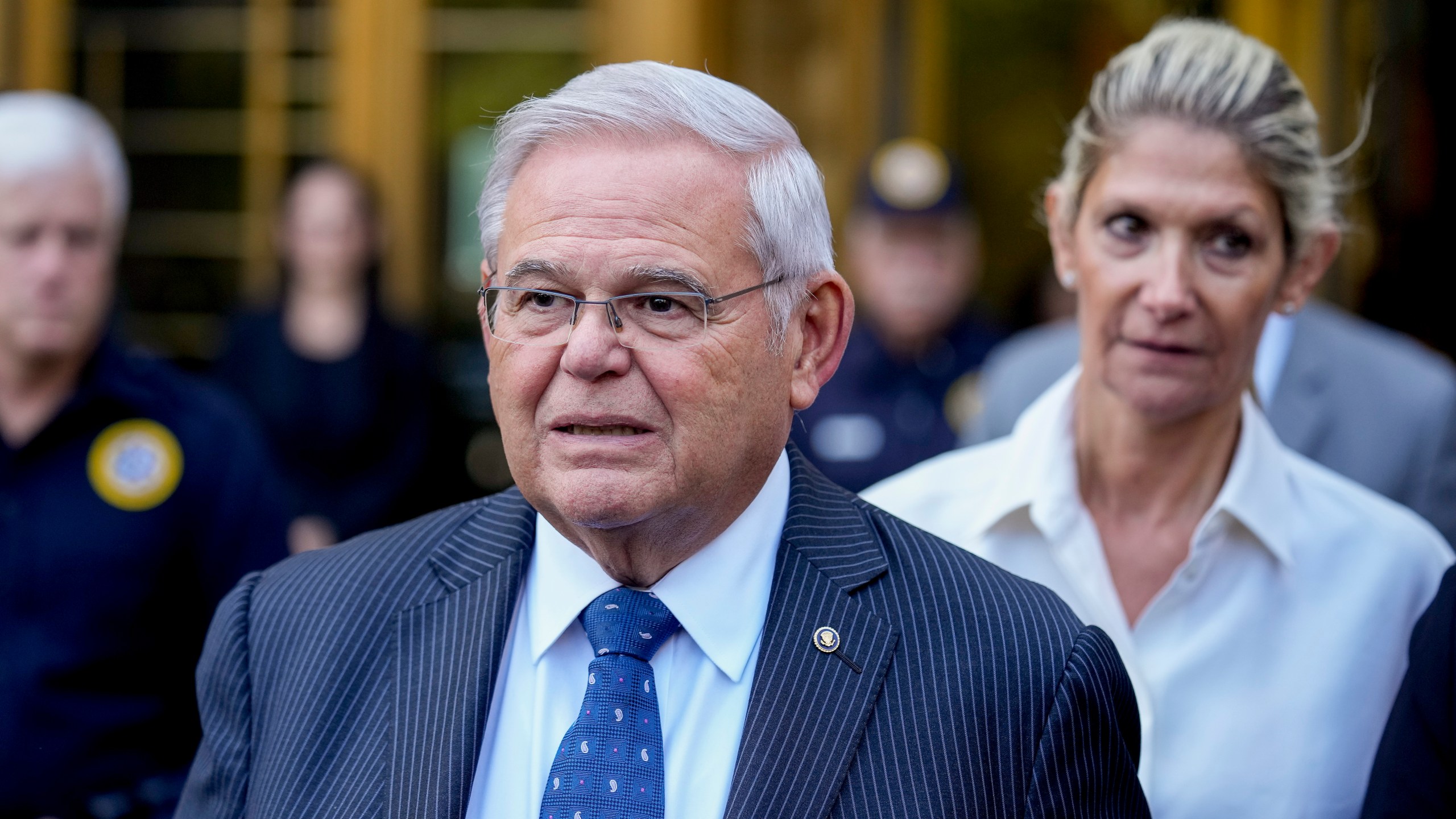 Sen. Bob Menendez and his wife, Nadine Menendez, leave federal court, Wednesday, Sept. 27, 2023, in New York. Menendez pled not guilty to federal charges alleging he used his powerful post to secretly advance Egyptian interests and carry out favors for local businessmen in exchange for bribes of cash and gold bars. (AP Photo/Seth Wenig)