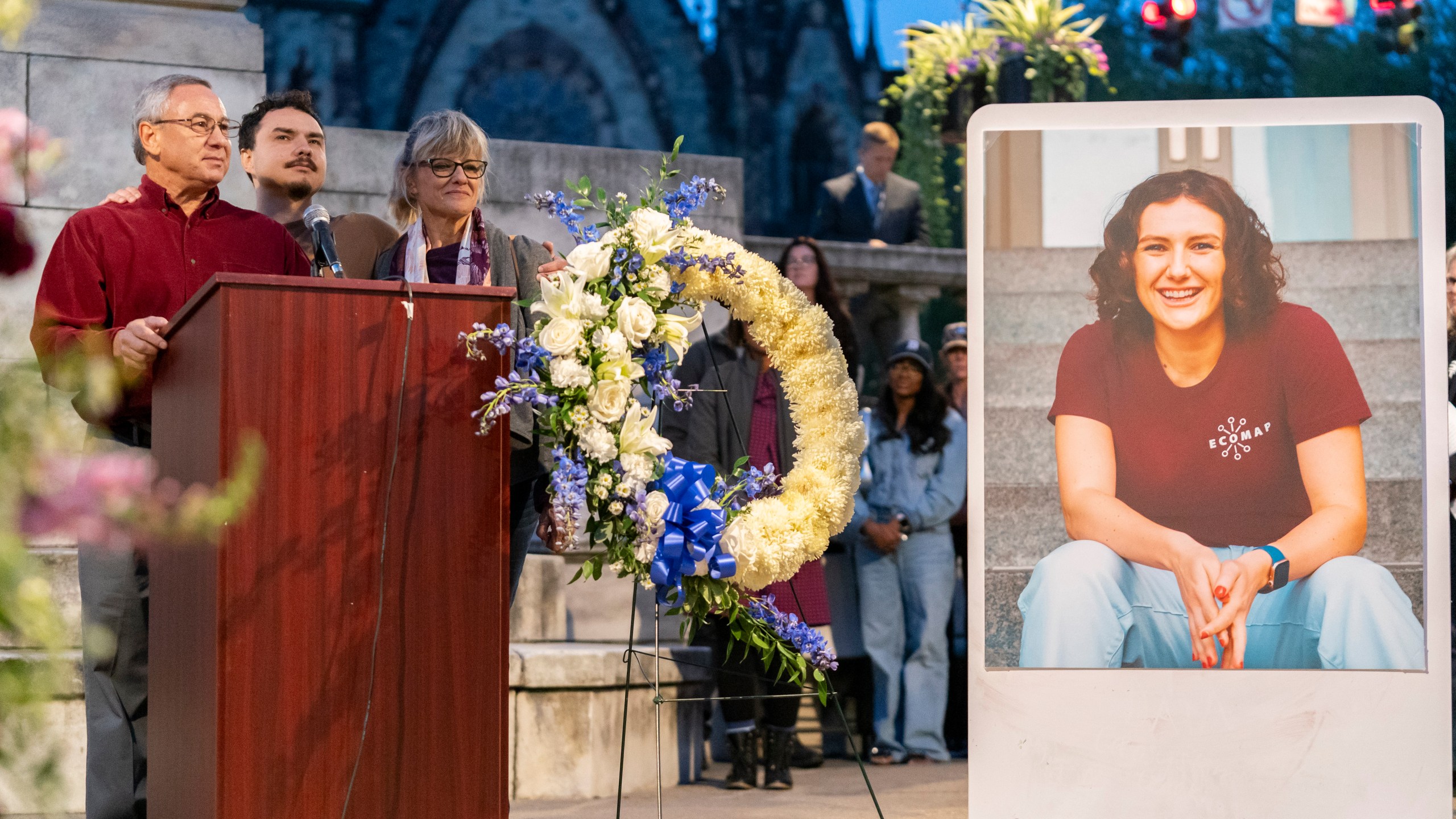 Frank LaPere, Nico LaPere and Caroline Frank, the family of Pava LaPere, founder of tech startup EcoMap Technologies, speak during a vigil on Wednesday, Sept. 27, 2023, in Baltimore. Loved ones are remembering the slain Baltimore tech entrepreneur for her compassion and dedication to helping others. Baltimore police found 26-year-old Pava LaPere dead from blunt force trauma in her apartment complex after she was reported missing late Monday morning. (AP Photo/Stephanie Scarbrough)