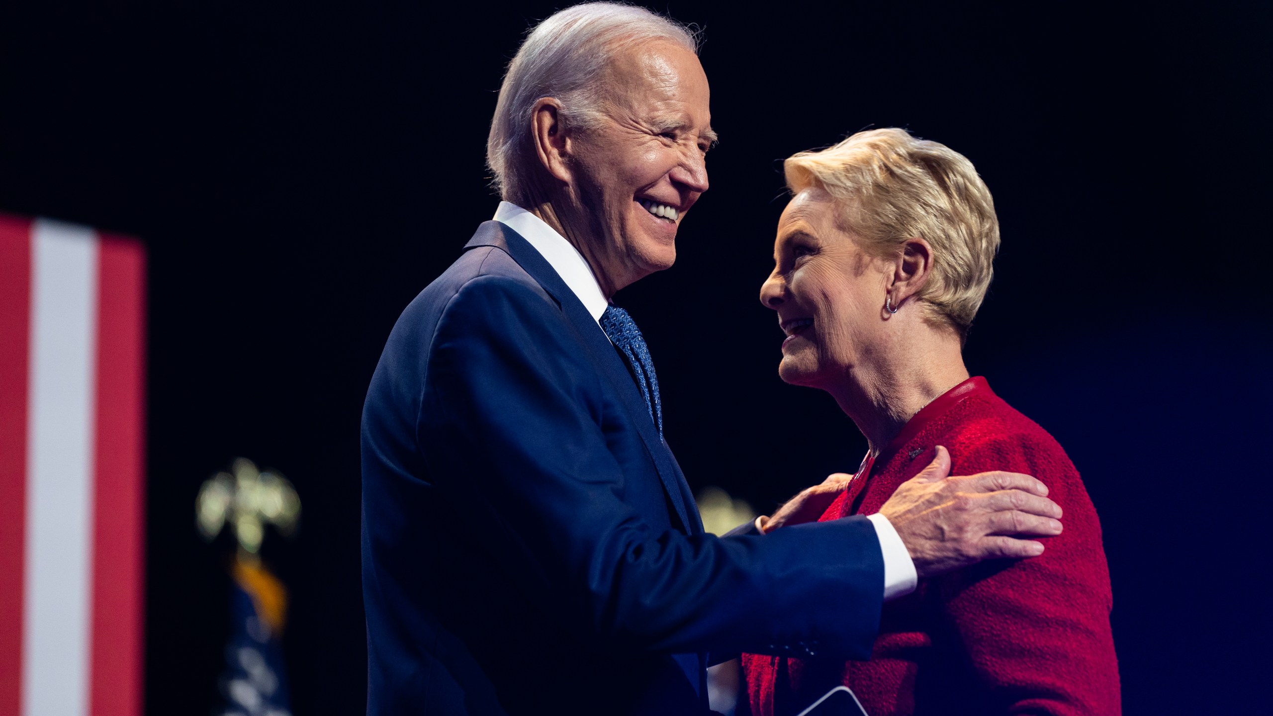 Cindy McCain, wife of late Sen. John McCain, greets President Joe Biden as he arrives to deliver remarks on democracy and honoring the legacy of Sen. McCain at the Tempe Center for the Arts, Thursday, Sept. 28, 2023, in Tempe, Ariz. (AP Photo/Evan Vucci)