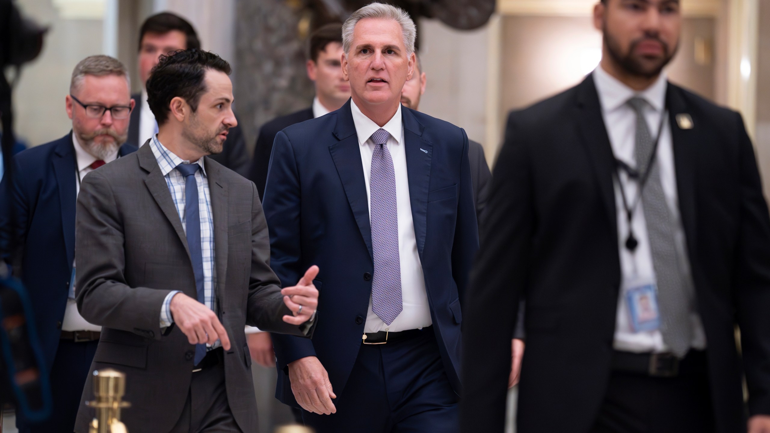 FILE - House Speaker Kevin McCarthy, R-Calif., walks to the chamber for procedural votes to advance appropriations bills, at the Capitol in Washington, Tuesday night, Sept. 26, 2023. McCarthy is digging in on his refusal to take up Senate legislation designed to keep the federal government fully running beyond midnight Saturday, Sept. 30. (AP Photo/J. Scott Applewhite, File)