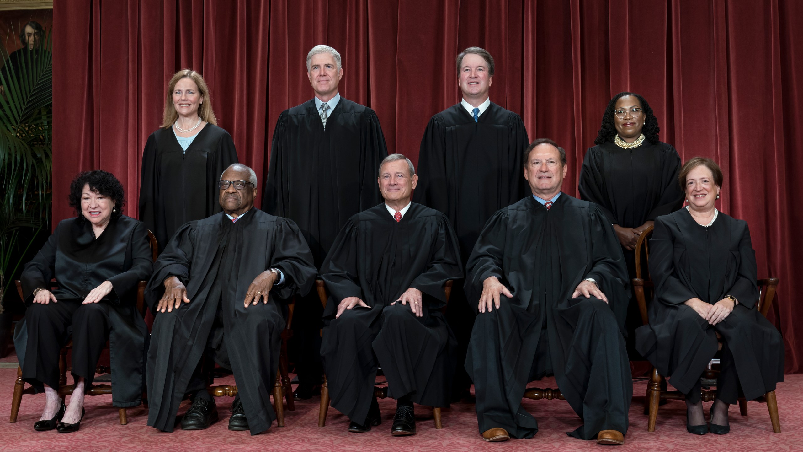 FILE - Members of the Supreme Court sit for a new group portrait following the addition of Associate Justice Ketanji Brown Jackson, at the Supreme Court building in Washington, Oct. 7, 2022. Bottom row, from left, Justice Sonia Sotomayor, Justice Clarence Thomas, Chief Justice John Roberts, Justice Samuel Alito, and Justice Elena Kagan. Top row, from left, Justice Amy Coney Barrett, Justice Neil Gorsuch, Justice Brett Kavanaugh, and Justice Ketanji Brown Jackson. The new term of the high court begins next Monday, Oct. 2, 2023. (AP Photo/J. Scott Applewhite, File)