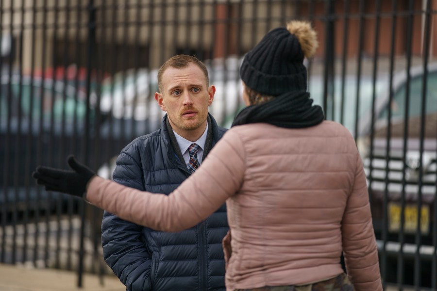 Josh Kruger, left, then the Communications Director, the Office of Homeless Services at City of Philadelphia, at a tent encampment in Philadelphia, on Jan. 6, 2020. The journalist and advocate who rose from homelessness and addiction to serve as a spokesperson for Philadelphia's most vulnerable was shot and killed at his home early Monday, Oct. 2, 2023 police said. (Jessica Griffin/The Philadelphia Inquirer via AP)