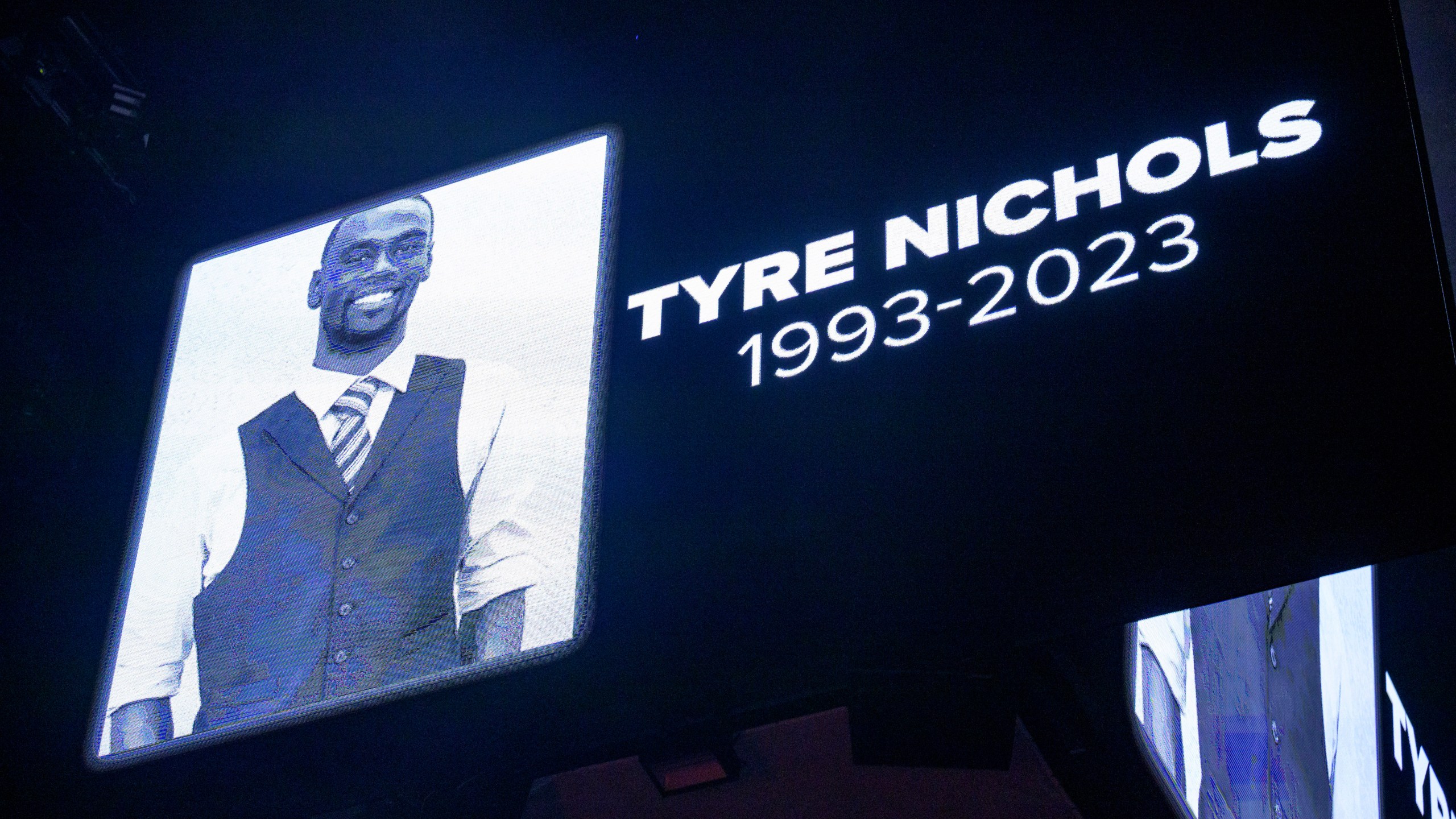 FILE - The screen at the Smoothie King Center in New Orleans honors Tyre Nichols before an NBA basketball game between the Pelicans and Wizards, Jan. 28, 2023. A judge on Monday, Oct. 2, denied requests by three former Memphis officers to have separate trials in the fatal beating of Nichols after a traffic stop. (AP Photo/Matthew Hinton, File)