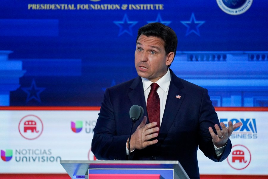 FILE - Florida Gov. Ron DeSantis speaks during a Republican presidential primary debate hosted by FOX Business Network and Univision, Wednesday, Sept. 27, 2023, at the Ronald Reagan Presidential Library in Simi Valley, Calif. (AP Photo/Mark J. Terrill, File)