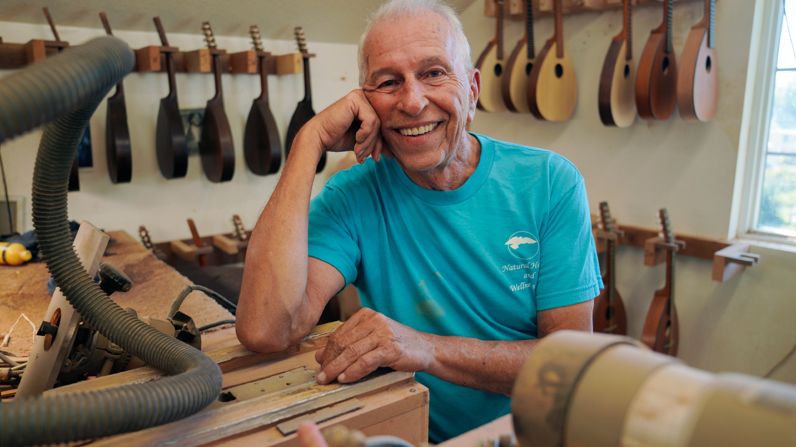 Mike Dulak sits for a portrait in his mandolin workshop in Rocheport, Mo., Friday, Sept. 8, 2023. Dulak does not associate with any religious group and self-identifies as "nothing in particular" when asked about his beliefs. He is part of the largest growing group of nonbelievers in the United States today, as nearly one in six adults claim the label "nothing in particular" according to the Associated Press- NORC Center for Public Affairs Research. (AP Photo/Jessie Wardarski)