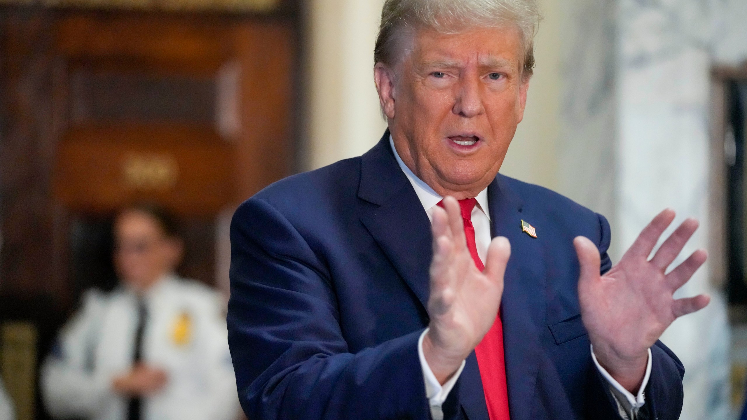 Former President Donald Trump speaks to the media before entering the courtroom at New York Supreme Court, Wednesday, Oct. 4, 2023, in New York. (AP Photo/Mary Altaffer)