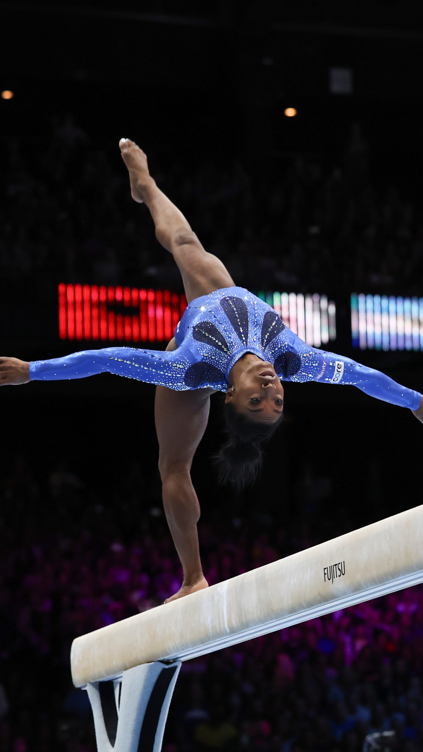 United States' Simone Biles competes on the beam during the women's all-round final at the Artistic Gymnastics World Championships in Antwerp, Belgium, Friday, Oct. 6, 2023. (AP Photo/Geert vanden Wijngaert)