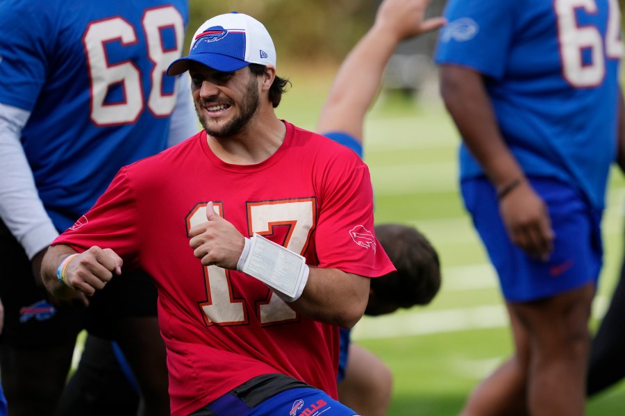 Buffalo Bills quarterback Josh Allen (17) warms up during a practice session in Watford, Hertfordshire, England, north-west of London, Friday, Oct. 6, 2023. The Buffalo Bills will take on the Jacksonville Jaguars in a regular season game at Tottenham Hotspur Stadium on Sunday. (AP Photo/Steve Luciano)